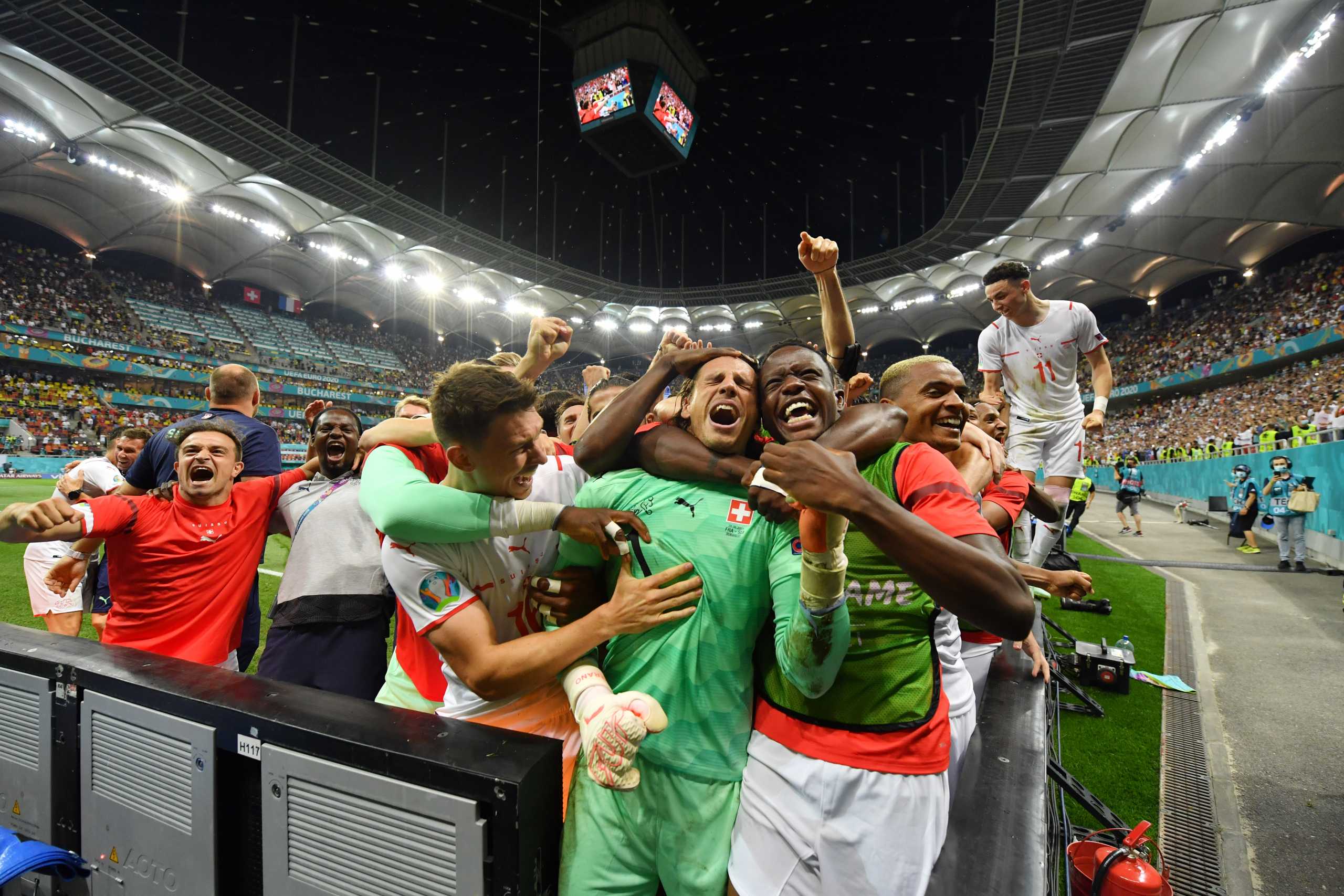 Soccer Football - Euro 2020 - Round of 16 - France v Switzerland - National Arena Bucharest, Bucharest, Romania - June 29, 2021   Switzerland's Yann Sommer and Breel Embolo celebrate after the match Pool via REUTERS