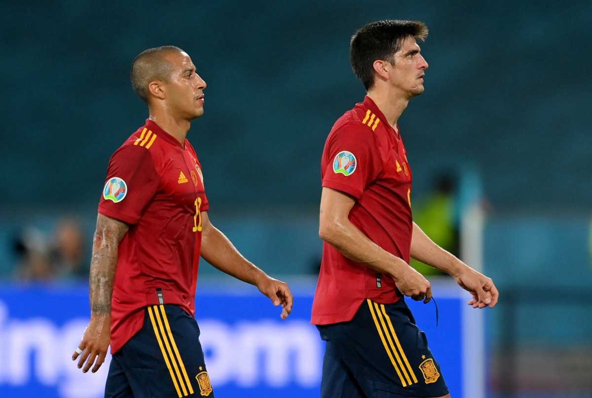 Soccer Football - Euro 2020 - Group E - Spain v Sweden - La Cartuja, Seville, Spain - June 14, 2021 Spain's Thiago and Gerard Moreno looks dejected after the match Pool via REUTERS