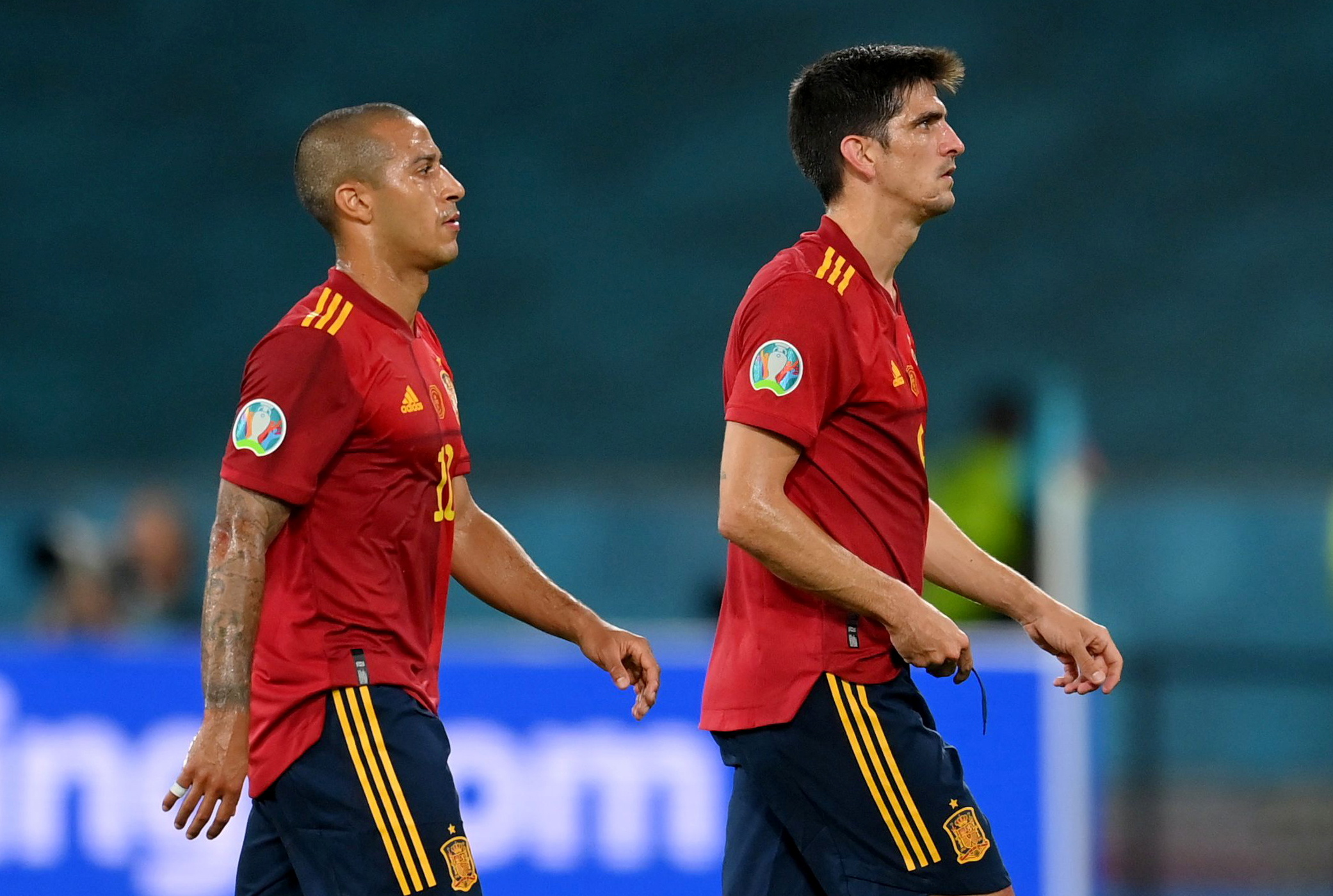 Soccer Football - Euro 2020 - Group E - Spain v Sweden - La Cartuja, Seville, Spain - June 14, 2021 Spain's Thiago and Gerard Moreno looks dejected after the match Pool via REUTERS