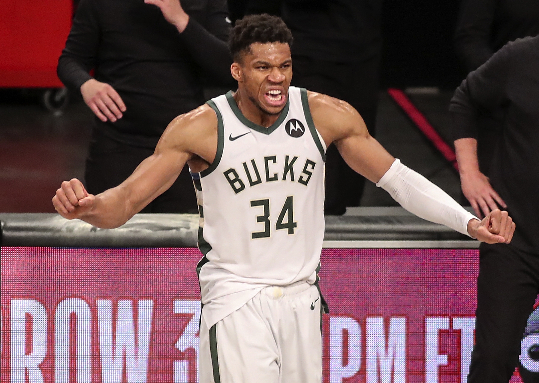 Jun 19, 2021; Brooklyn, New York, USA; Milwaukee Bucks forward Giannis Antetokounmpo (34) celebrates after defeating the Brooklyn Nets in overtime in game seven in the second round of the 2021 NBA Playoffs at Barclays Center. Mandatory Credit: Wendell Cruz-USA TODAY Sports
