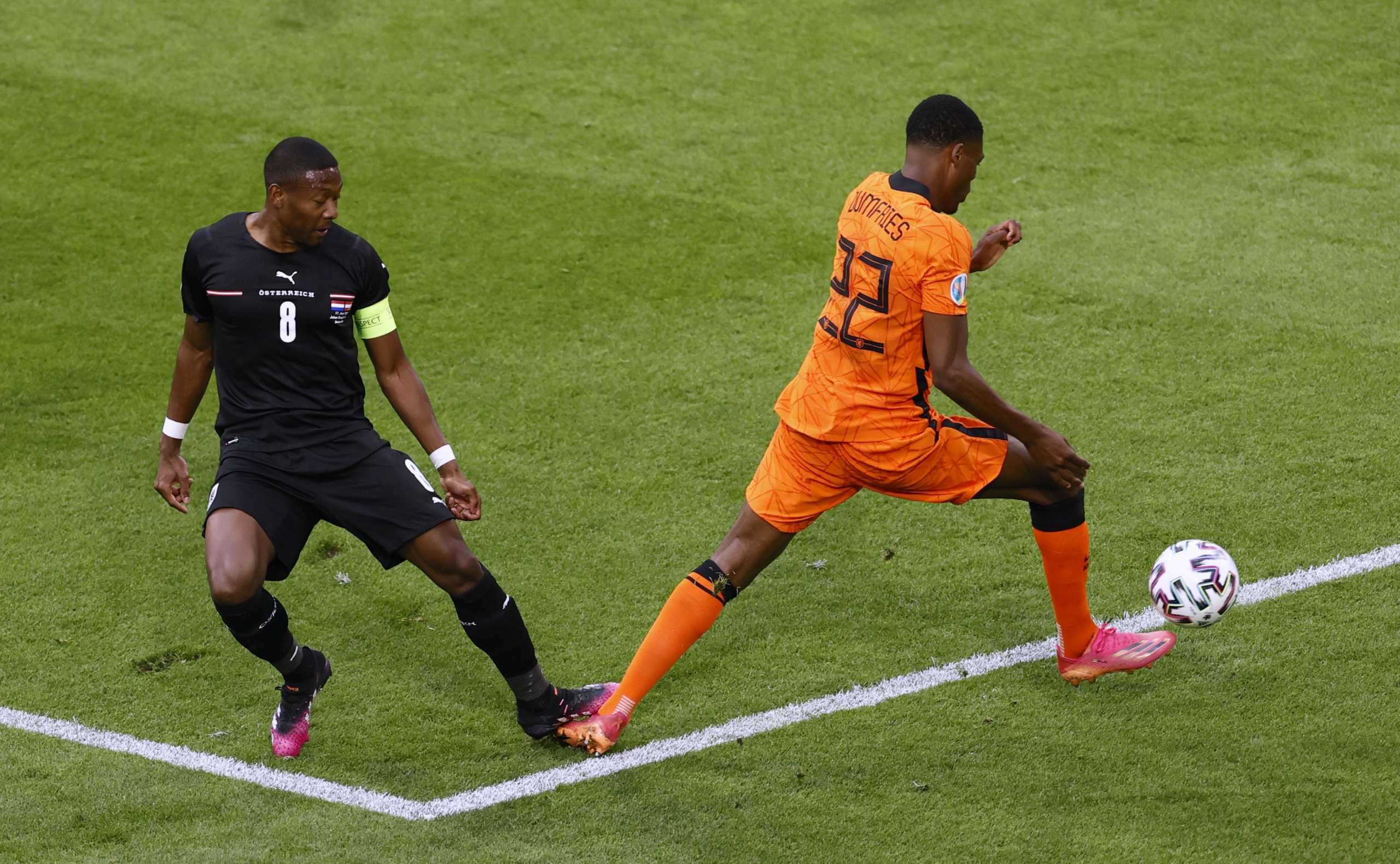 Soccer Football - Euro 2020 - Group C - Netherlands v Austria - Johan Cruijff ArenA, Amsterdam, Netherlands - June 17, 2021 Netherlands' Denzel Dumfries is brought down by Austria's David Alaba before a penalty is awarded to Netherlands upon VAR review Pool via REUTERS