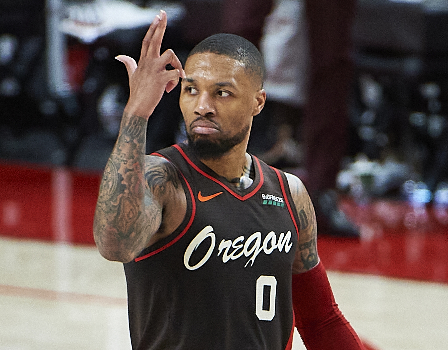 Jun 3, 2021; Portland, Oregon, USA; Portland Trail Blazers guard Damian Lillard (0) celebrates after scoring a three point basket in the first half against the Denver Nuggets during game six in the first round of the 2021 NBA Playoffs. at Moda Center. Mandatory Credit: Troy Wayrynen-USA TODAY Sports