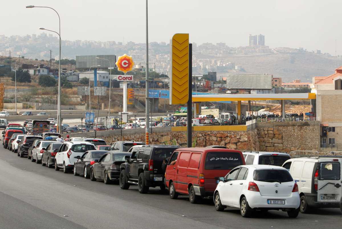 Cars stand in line at a gas station as they wait to fuel up in Damour, Lebanon June 25, 2021. REUTERS