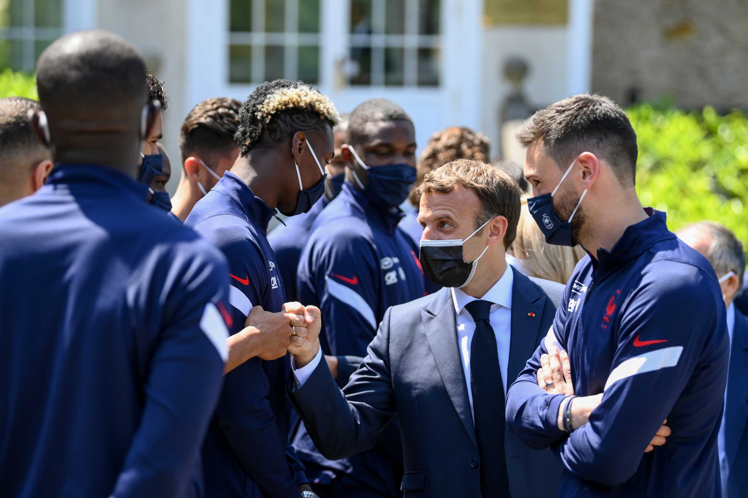 French President Emmanuel Macron greets France's players before a lunch in Clairefontaine-en-Yvelines, France June 10, 2021, ahead of the UEFA EURO 2020 football competition. Franck Fife