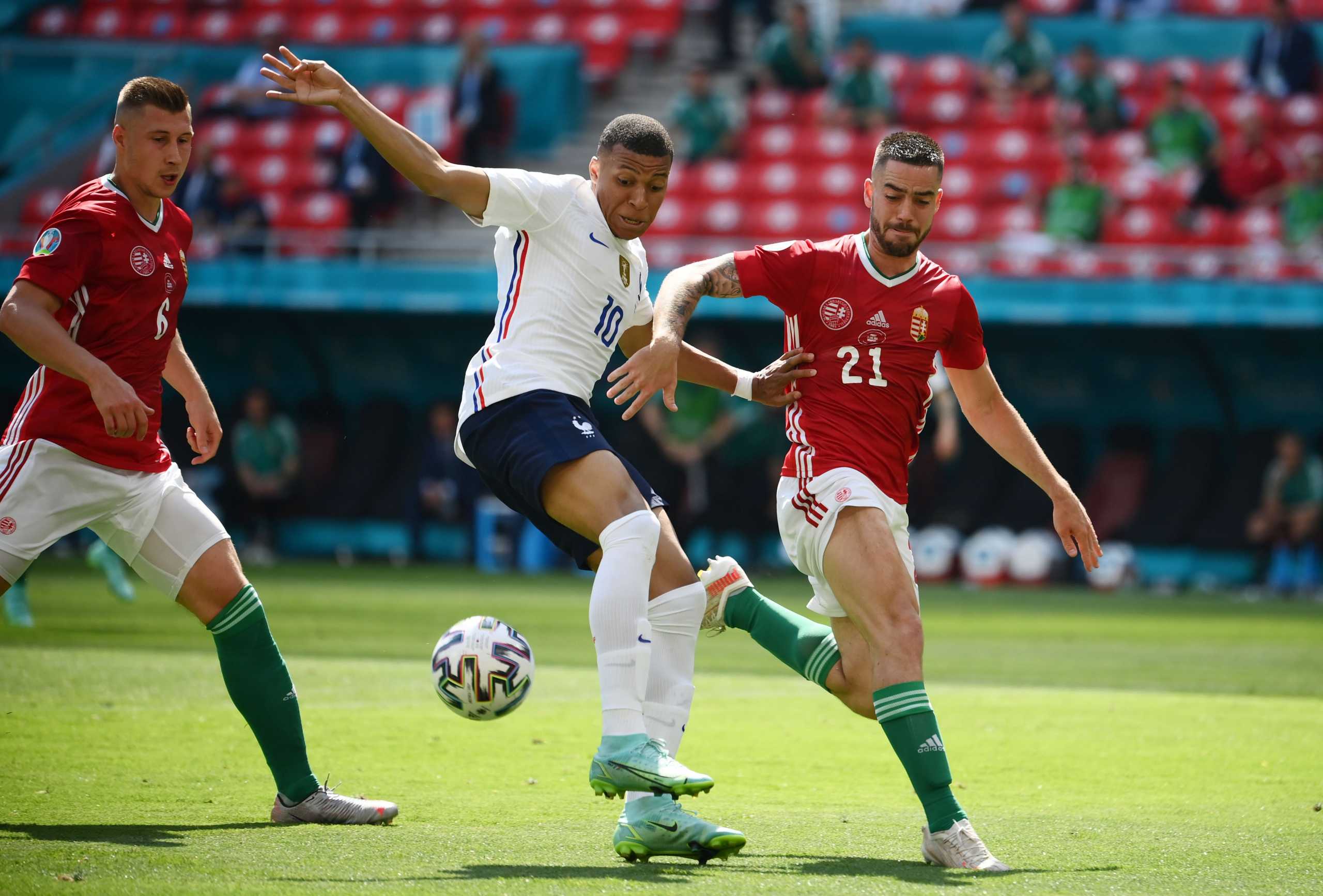 Soccer Football - Euro 2020 - Group F - Hungary v France - Puskas Arena, Budapest, Hungary - June 19, 2021 France's Kylian Mbappe in action with Hungary's Endre Botka Pool via REUTERS