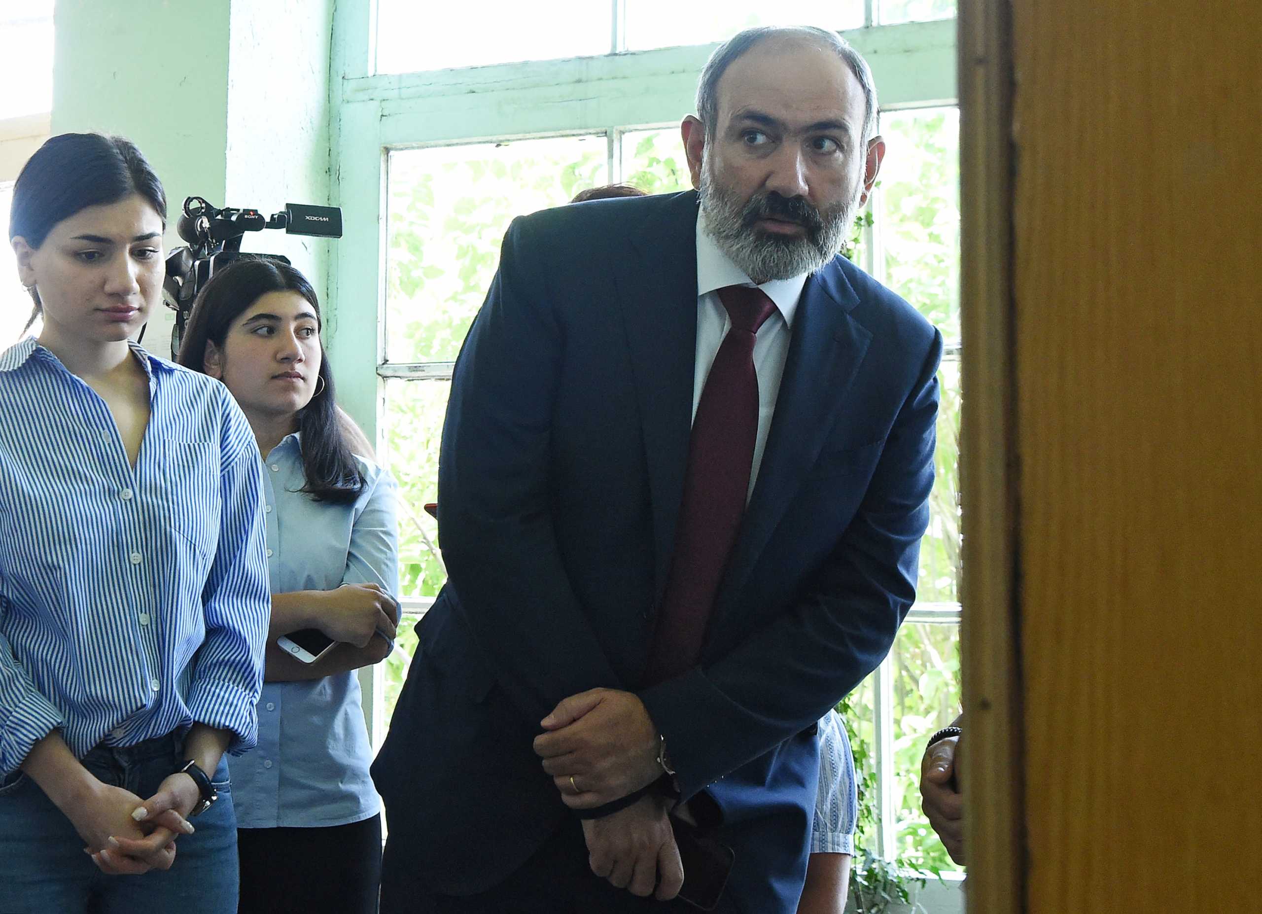 Armenia's acting Prime Minister and leader of Civil Contract party Nikol Pashinyan visits a polling station to cast his vote during the snap parliamentary election in Yerevan, Armenia June 20, 2021. Lusi Sargsyan