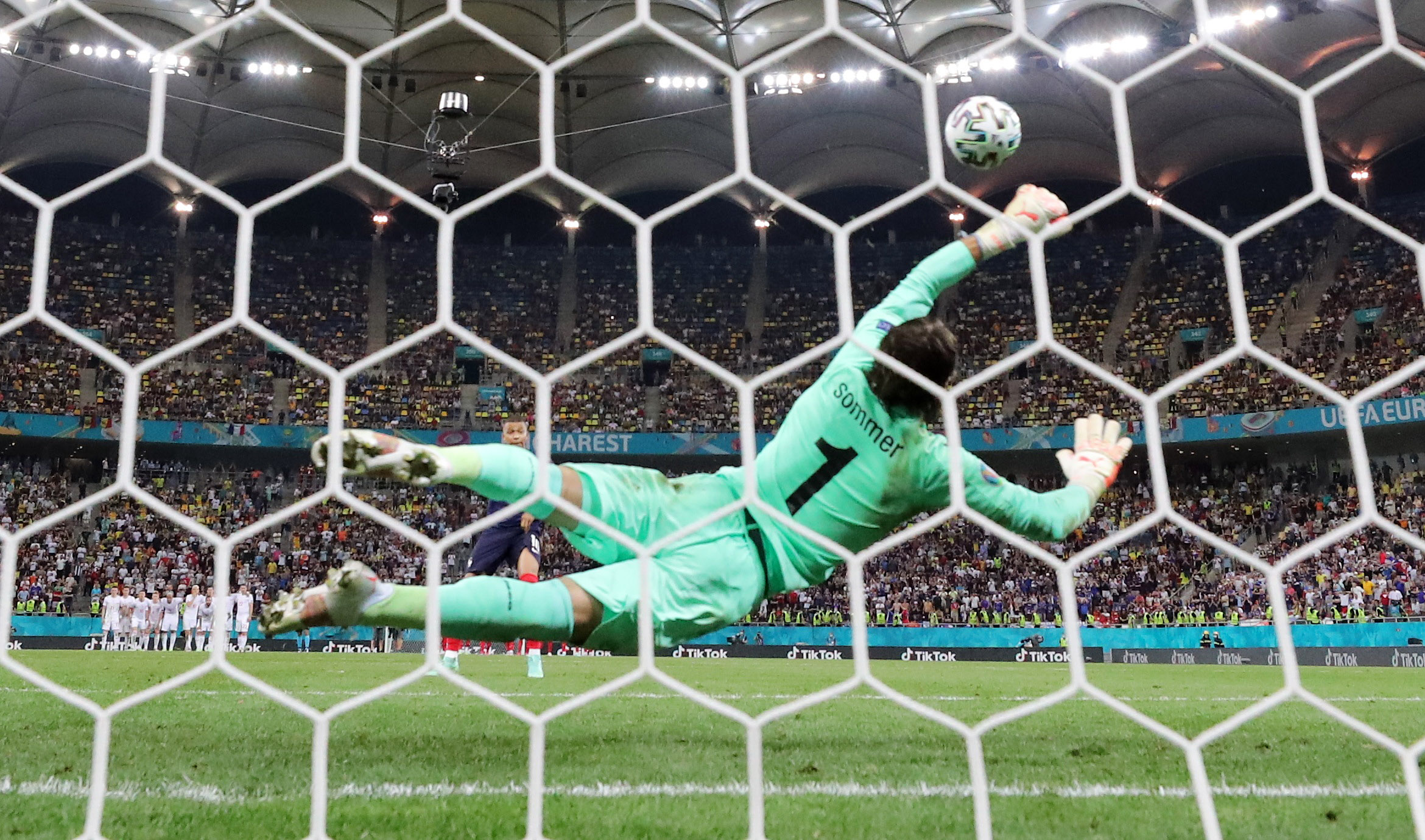 Soccer Football - Euro 2020 - Round of 16 - France v Switzerland - National Arena Bucharest, Bucharest, Romania - June 29, 2021   Switzerland's Yann Sommer saves a penalty from France's Kylian Mbappe during the shoot-out REUTERS