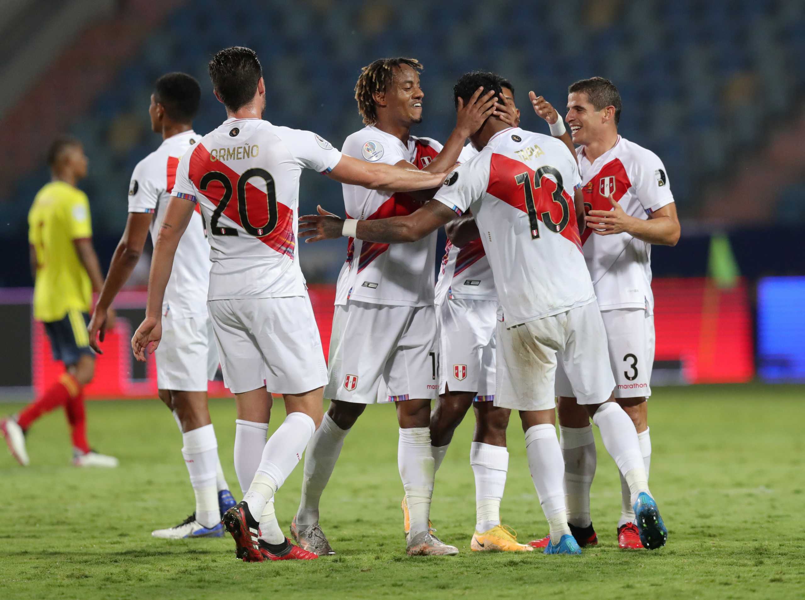 Soccer Football - Copa America 2021 - Group B - Colombia v Peru - Estadio Olimpico, Goiania, Brazil - June 20, 2021 Peru's Andre Carrillo celebrates after the match with teammates REUTERS