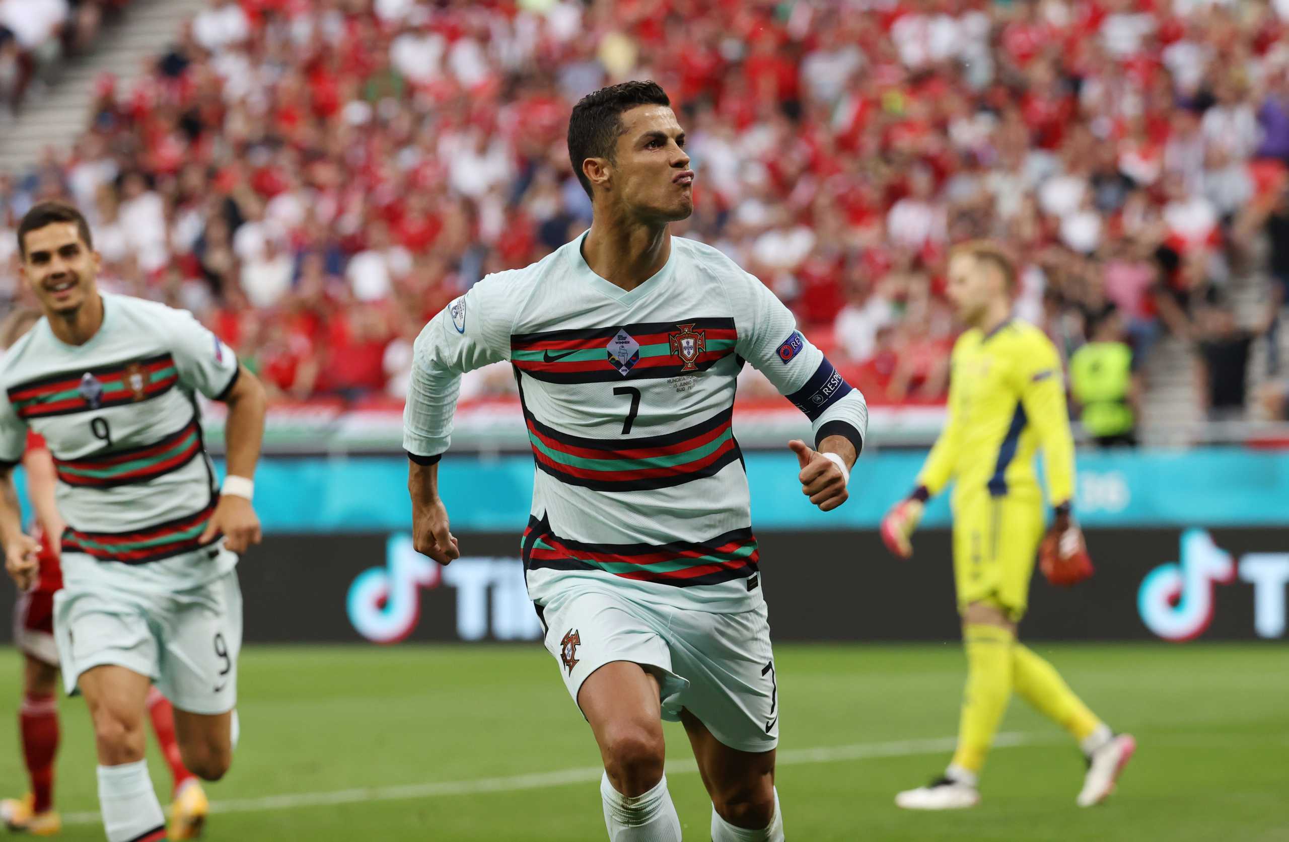 Soccer Football - Euro 2020 - Group F - Hungary v Portugal - Puskas Arena, Budapest, Hungary - June 15, 2021 Portugal's Cristiano Ronaldo celebrates scoring their second goal Pool via REUTERS