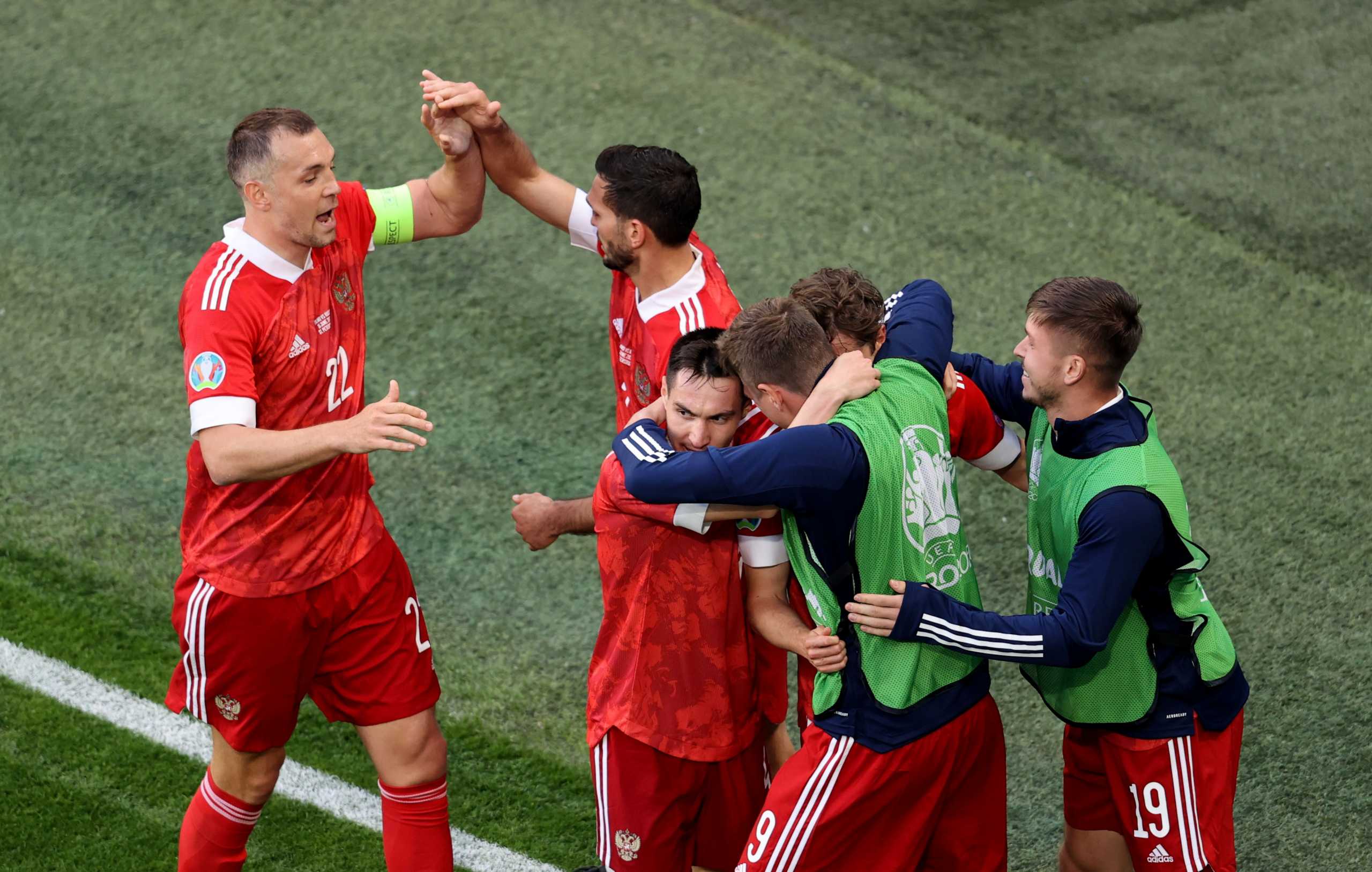 Soccer Football - Euro 2020 - Group B - Finland v Russia - Saint Petersburg Arena, Saint Petersburg, Russia - June 16, 2021 Russia's Aleksei Miranchuk celebrates scoring their first goal with teammates Pool via REUTERS