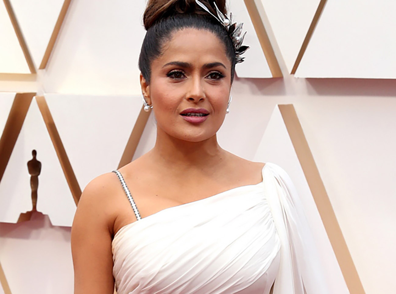 epa08207833 Salma Hayek arrives for the 92nd annual Academy Awards ceremony at the Dolby Theatre in Hollywood, California, USA, 09 February 2020. The Oscars are presented for outstanding individual or collective efforts in filmmaking in 24 categories.  EPA