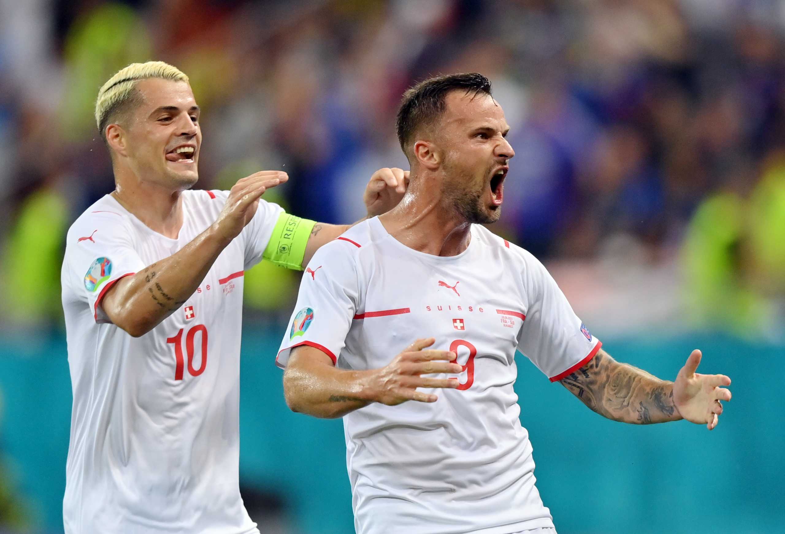 Soccer Football - Euro 2020 - Round of 16 - France v Switzerland - National Arena Bucharest, Bucharest, Romania - June 28, 2021 Switzerland's Haris Seferovic celebrates scoring their first goal with Granit Xhaka Pool via REUTERS