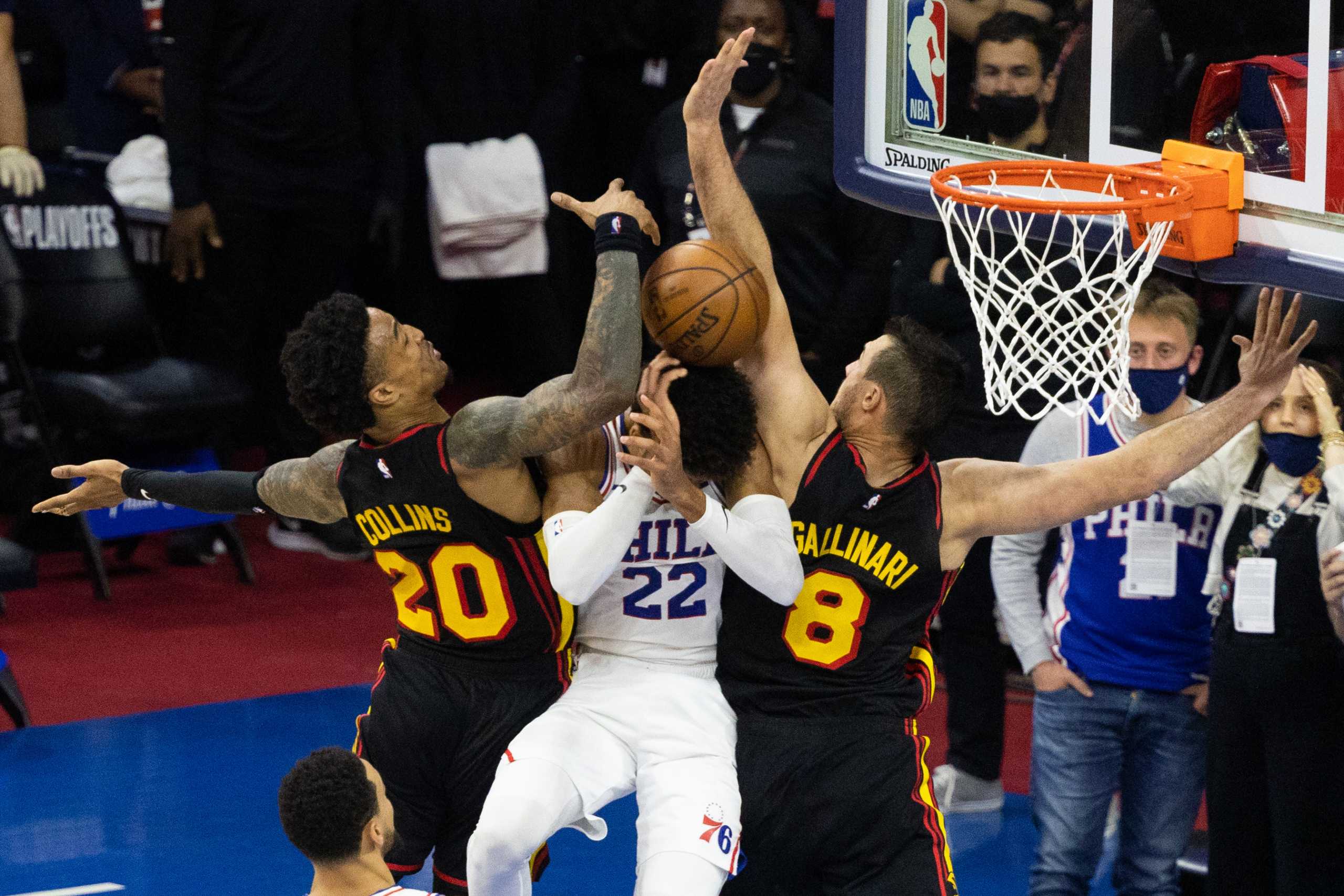Jun 20, 2021; Philadelphia, Pennsylvania, USA; Atlanta Hawks forward John Collins (20) and forward Danilo Gallinari (8) block the drive attempt of Philadelphia 76ers guard Matisse Thybulle (22) during the fourth quarter in game seven of the second round of the 2021 NBA Playoffs at Wells Fargo Center. Mandatory Credit: Bill Streicher-USA TODAY Sports