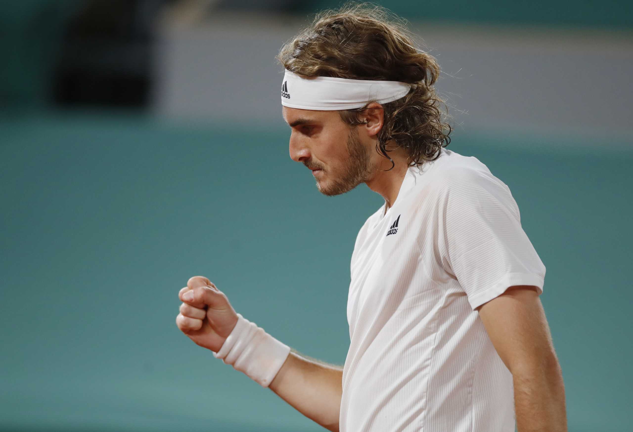 Tennis - French Open - Roland Garros, Paris, France - June 4, 2021   Greece's Stefanos Tsitsipas  reacts during his third round match against John Isner of the U.S. REUTERS