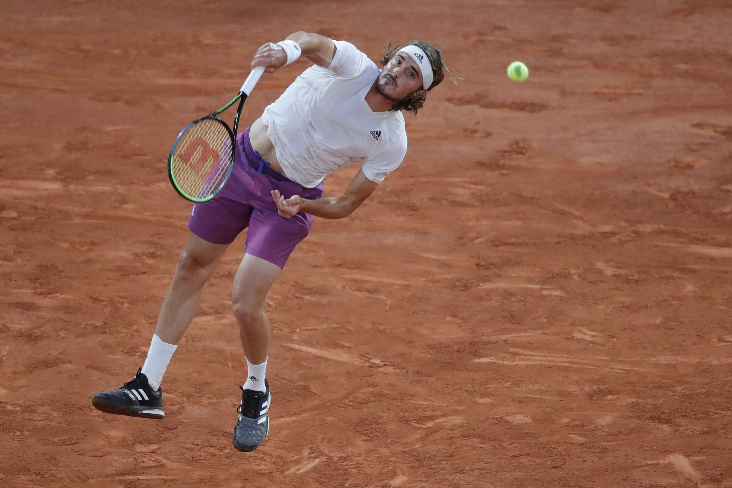 Tennis - French Open - Roland Garros, Paris, France - June 8, 2021 Greece's Stefanos Tsitsipas in action during his quarter final match against Russia's Daniil Medvedev REUTERS