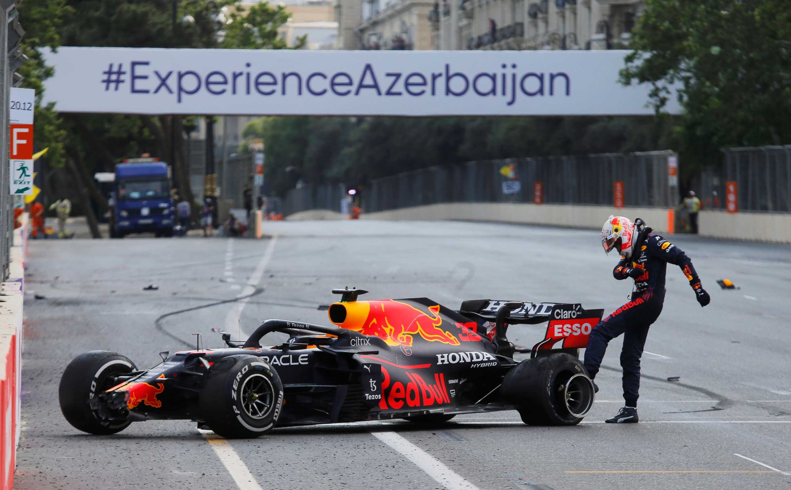 Formula One F1 - Azerbaijan Grand Prix - Baku City Circuit, Baku, Azerbaijan - June 6, 2021 Red Bull's Max Verstappen kicks the wheel of his car after crashing out of the race REUTERS