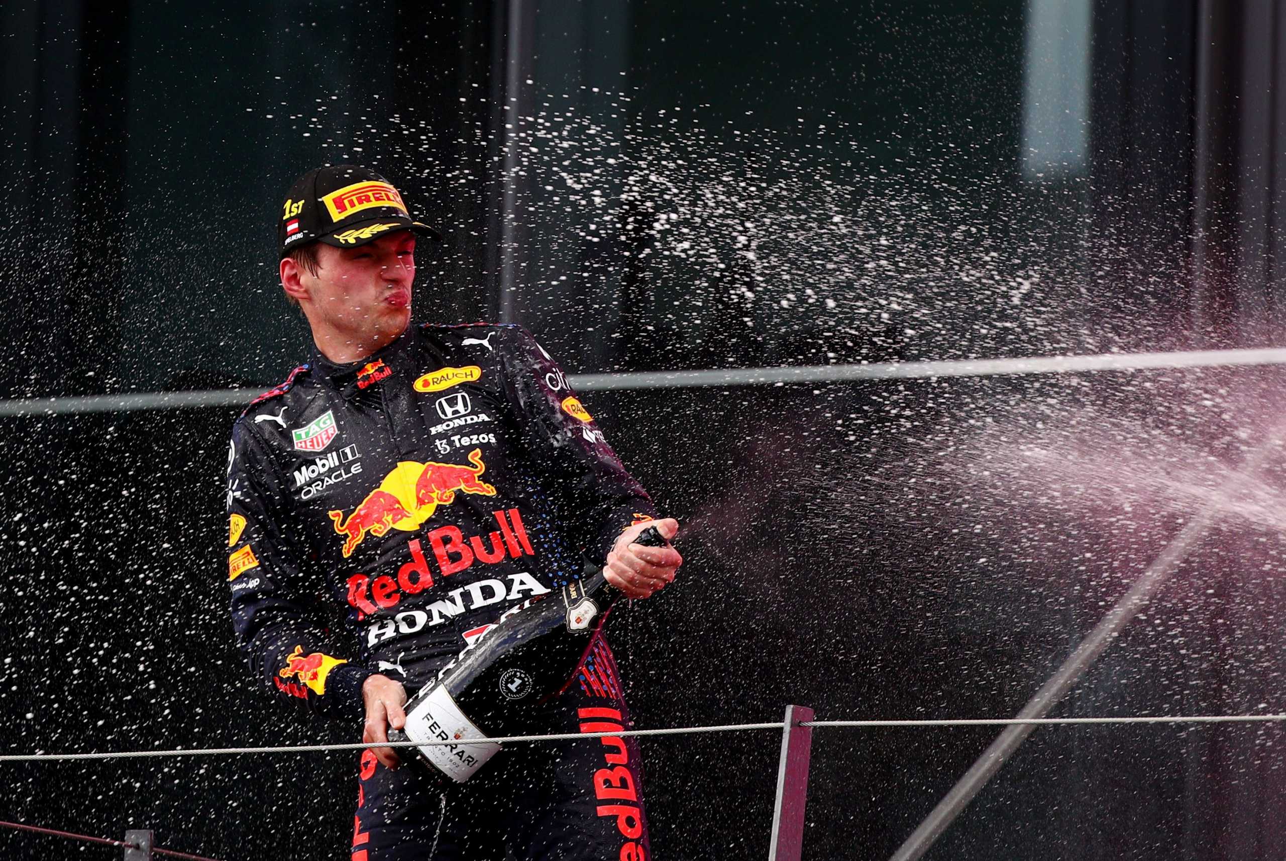Formula One F1 - Steiermark Grand Prix - Red Bull Ring, Spielberg, Styria, Austria - June 27, 2021 Red Bull's Max Verstappen celebrates on the podium after winning the race REUTERS