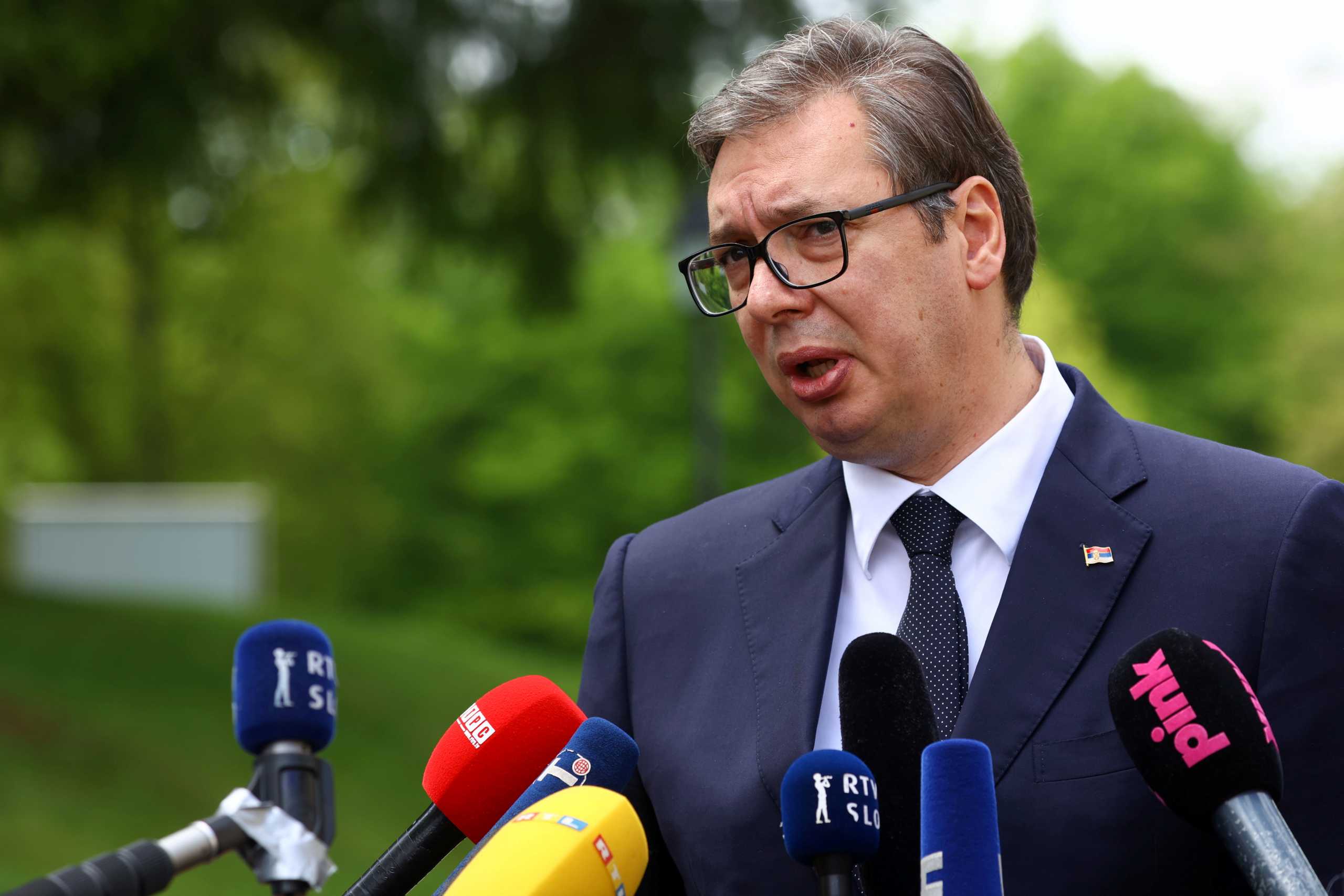 President of Serbia Aleksandar Vucic speaks to the press at a park during the 10th anniversary of the Brdo-Brijuni Process, in Brdo pri Kranju, Slovenia, May 17, 2021. REUTERS