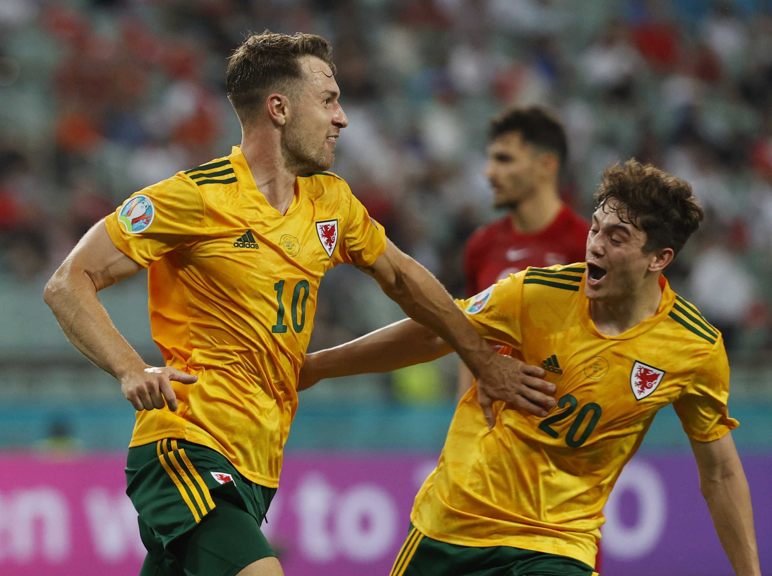 Soccer Football - Euro 2020 - Group A - Turkey v Wales - Baku Olympic Stadium, Baku, Azerbaijan - June 16, 2021 Wales' Aaron Ramsey celebrates scoring their first goal with Daniel James Pool via REUTERS
