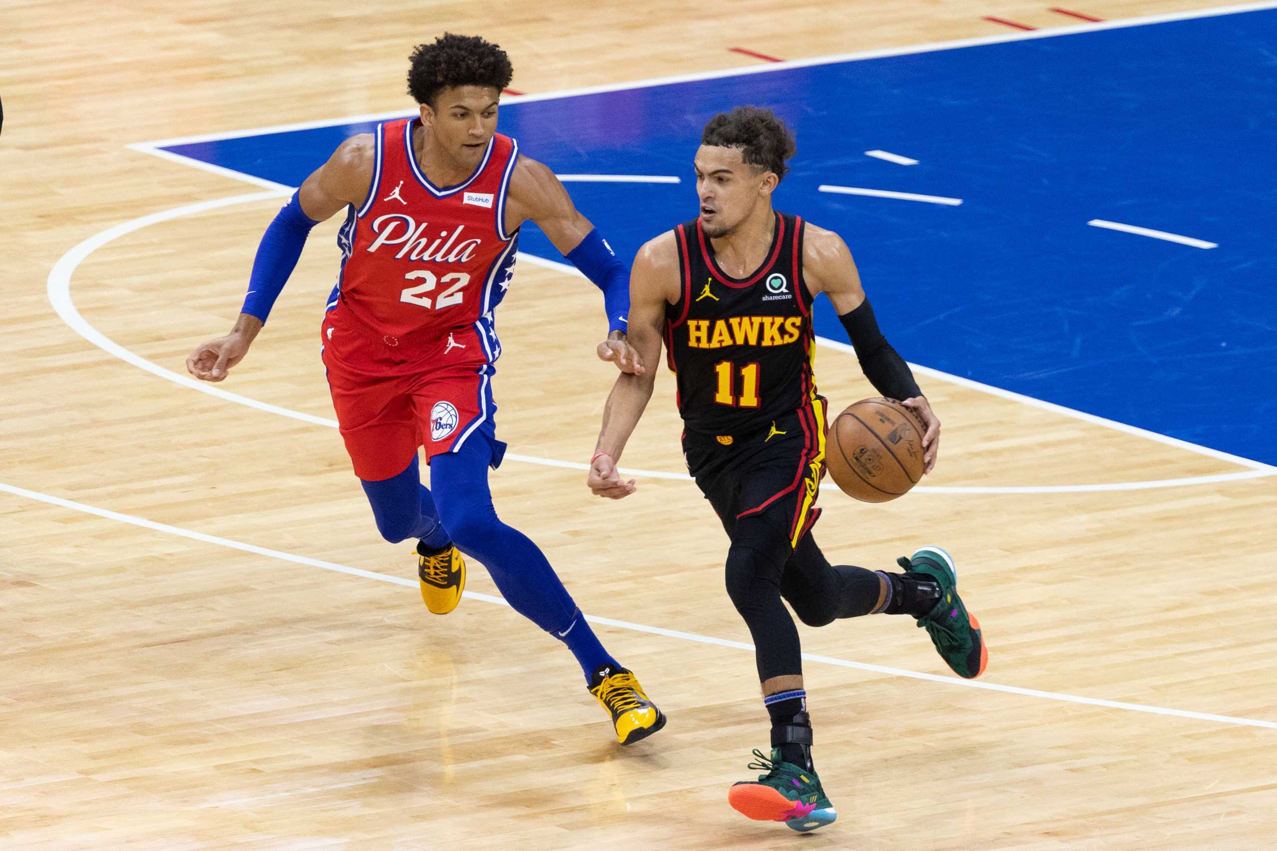 Jun 6, 2021; Philadelphia, Pennsylvania, USA; Atlanta Hawks guard Trae Young (11) dribbles up court against Philadelphia 76ers guard Matisse Thybulle (22) during the third quarter of game one in the second round of the 2021 NBA Playoffs at Wells Fargo Center. Mandatory Credit: Bill Streicher-USA TODAY Sports