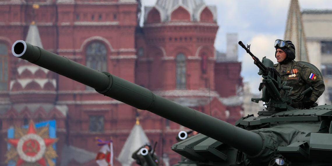 Russian servicemen drive a tank during a rehearsal for the Victory Day parade, which marks the anniversary of the victory over Nazi Germany in World War Two, in Red Square in central Moscow, Russia May 7, 2021. REUTERS