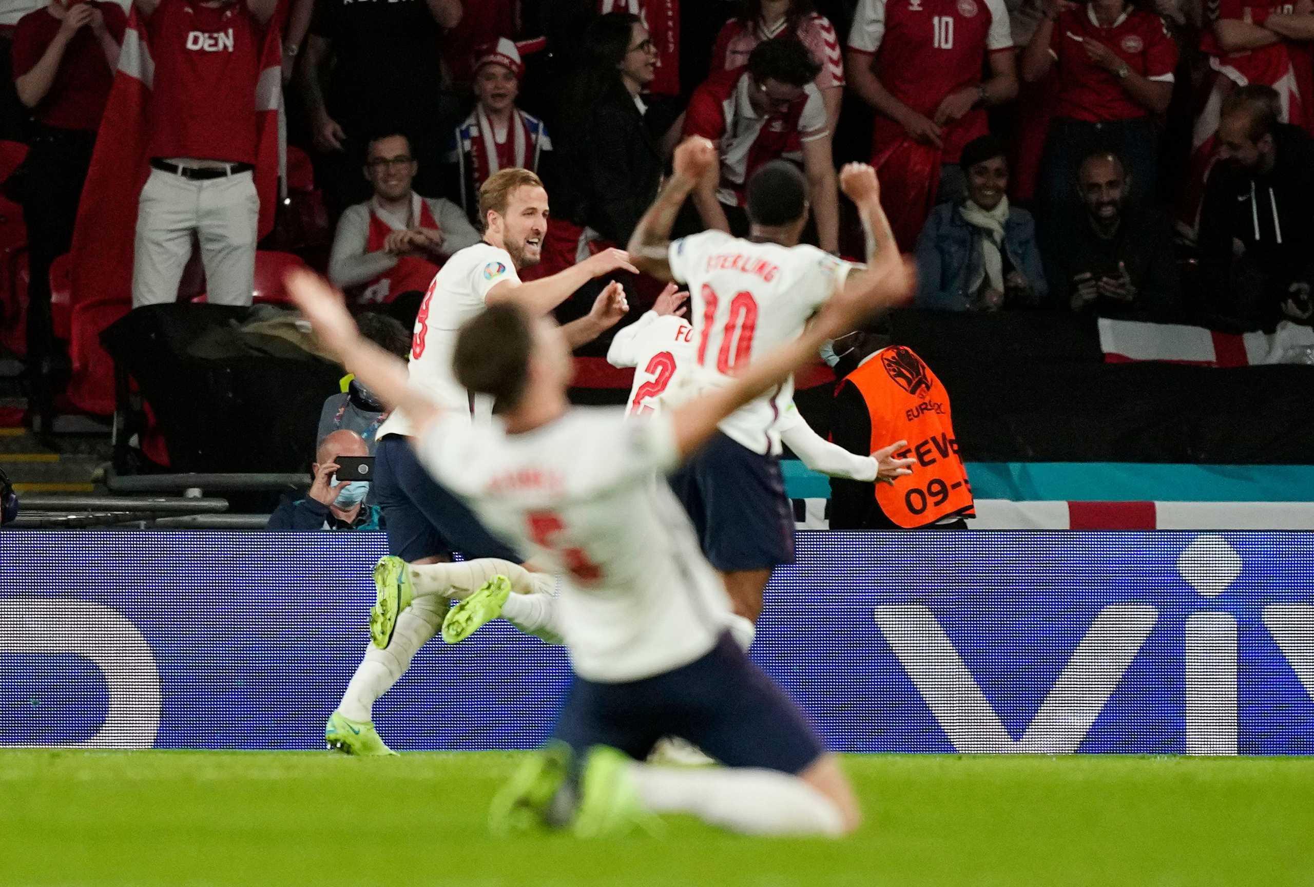 Soccer Football - Euro 2020 - Semi Final - England v Denmark - Wembley Stadium, London, Britain - July 7, 2021 England's Harry Kane celebrates scoring their second goal with teammates Pool via REUTERS