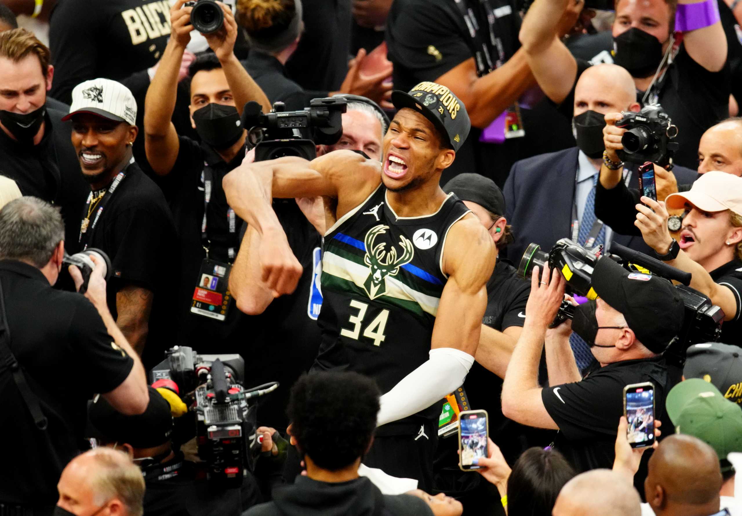 Jul 20, 2021; Milwaukee, Wisconsin, USA;  Milwaukee Bucks forward Giannis Antetokounmpo (34) celebrates after game six of the 2021 NBA Finals against the Phoenix Suns at Fiserv Forum. Mandatory Credit: Mark J. Rebilas-USA TODAY Sports