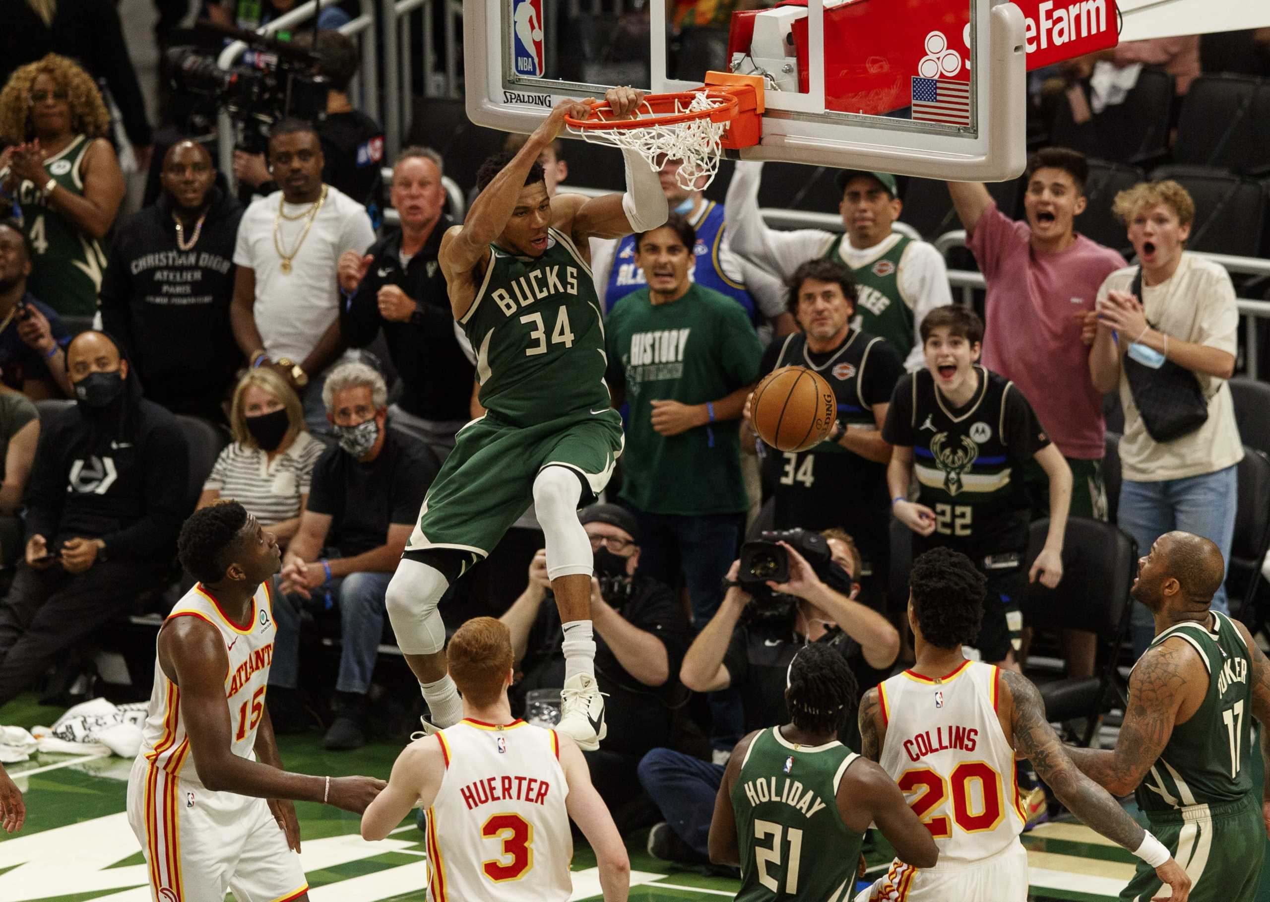 Jun 23, 2021; Milwaukee, Wisconsin, USA;  Milwaukee Bucks forward Giannis Antetokounmpo (34) dunks during the fourth quarter against the Atlanta Hawks during game one of the Eastern Conference Finals for the 2021 NBA Playoffs at Fiserv Forum. Mandatory Credit: Jeff Hanisch-USA TODAY Sports