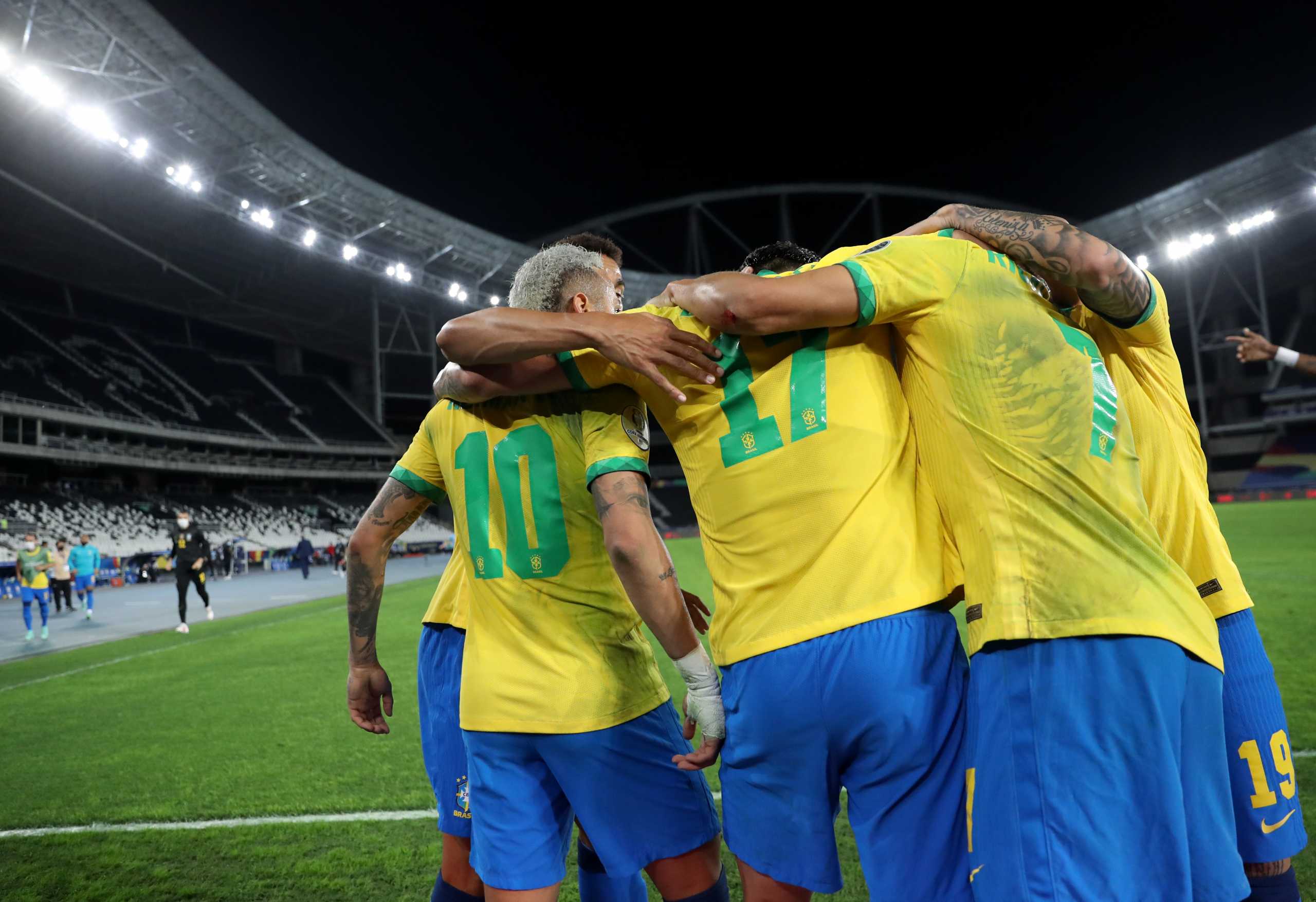 Soccer Football - Copa America 2021 - Semi Final - Brazil v Peru - Estadio Nilton Santos, Rio de Janeiro, Brazil - July 5, 2021 Brazil's Lucas Paqueta celebrates scoring their first goal with teammates REUTERS