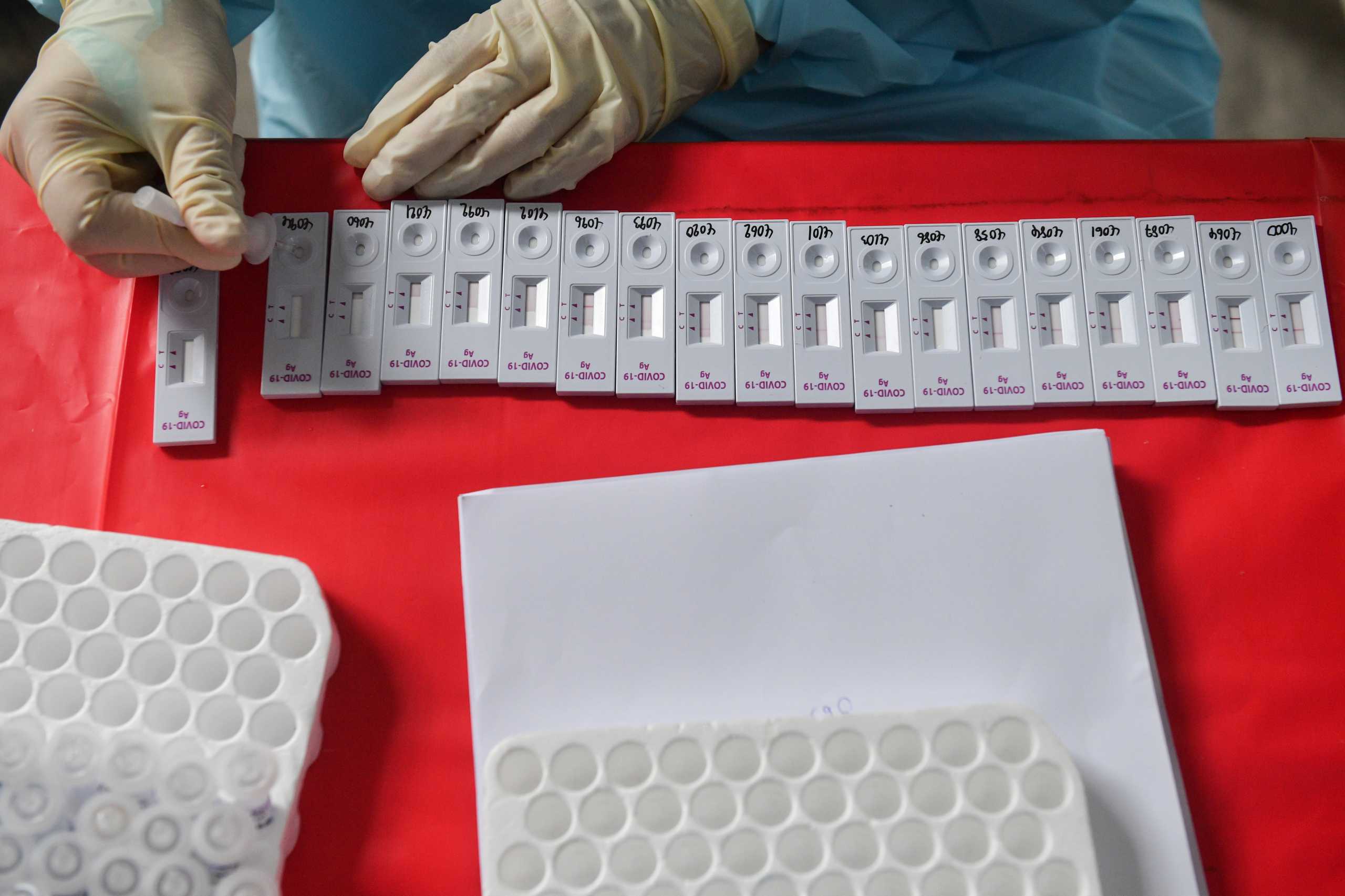 A healthcare worker performs a coronavirus disease (COVID-19) antigen test at a rapid antigen mass testing station, as the spread of COVID-19 continues, in Bangkok, Thailand, July 15, 2021. REUTERS