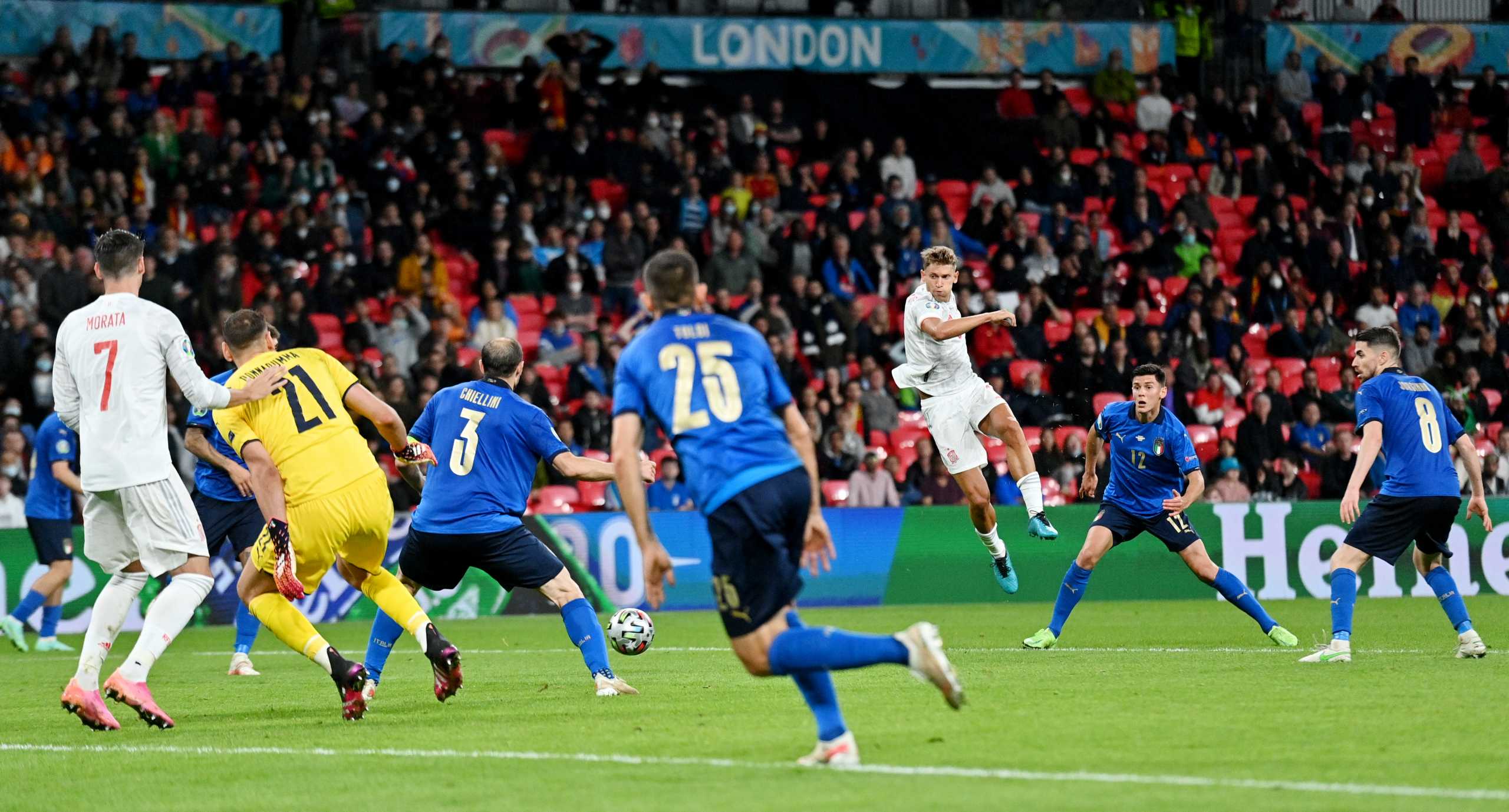Soccer Football - Euro 2020 - Semi Final - Italy v Spain - Wembley Stadium, London, Britain - July 6, 2021 Spain's Marcos Llorente shoots at goal Pool via REUTERS