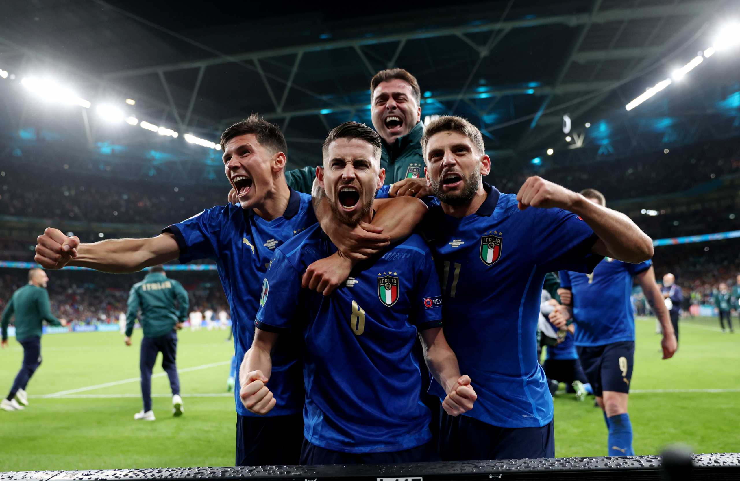 Soccer Football - Euro 2020 - Semi Final - Italy v Spain - Wembley Stadium, London, Britain - July 6, 2021 Italy's Jorginho with teammates celebrate after winning the penalty shoot-out Pool via REUTERS