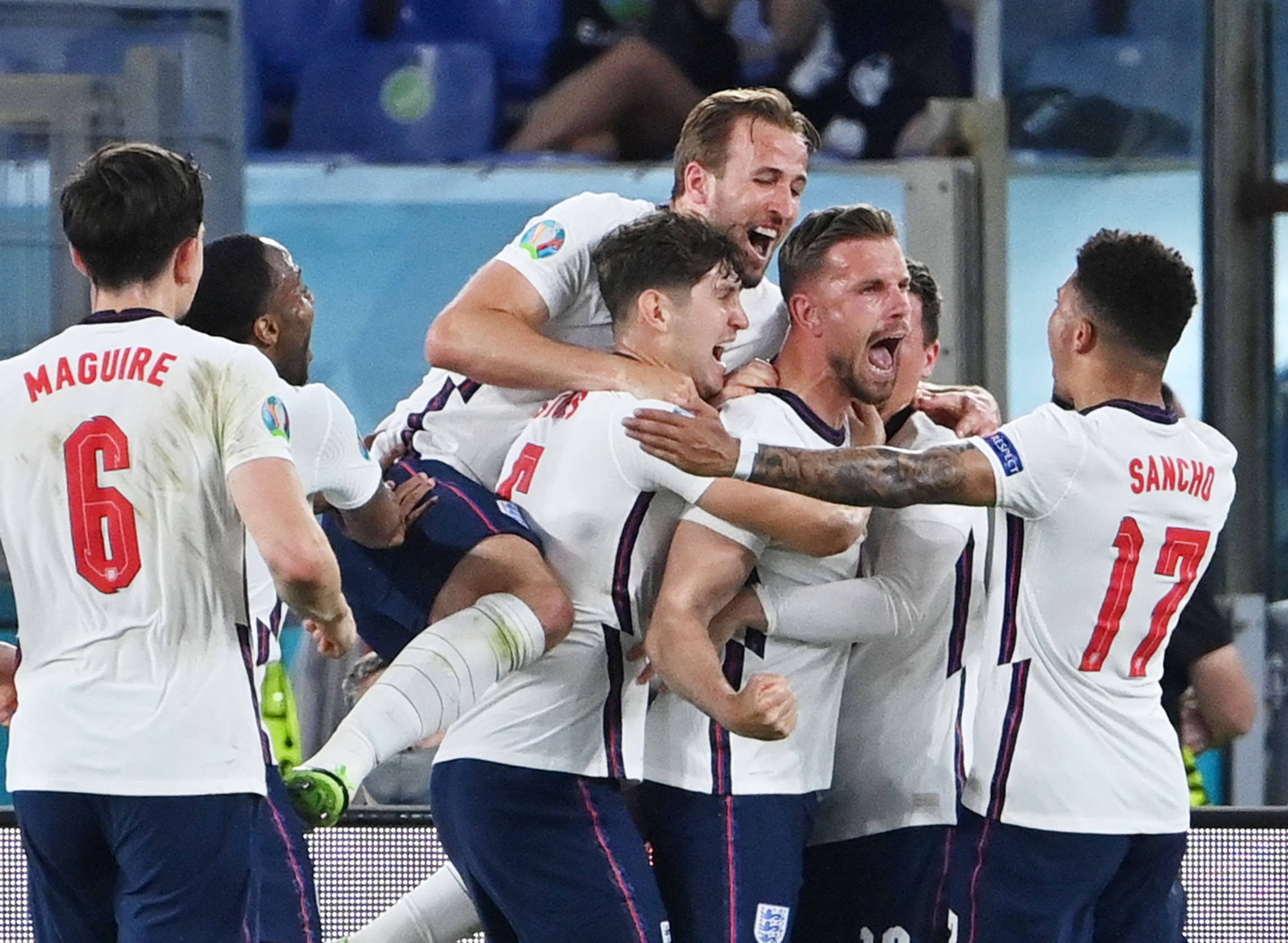 Soccer Football - Euro 2020 - Quarter Final - Ukraine v England - Stadio Olimpico, Rome, Italy - July 3, 2021  England's Jordan Henderson celebrates scoring their fourth goal with teammates Pool via REUTERS