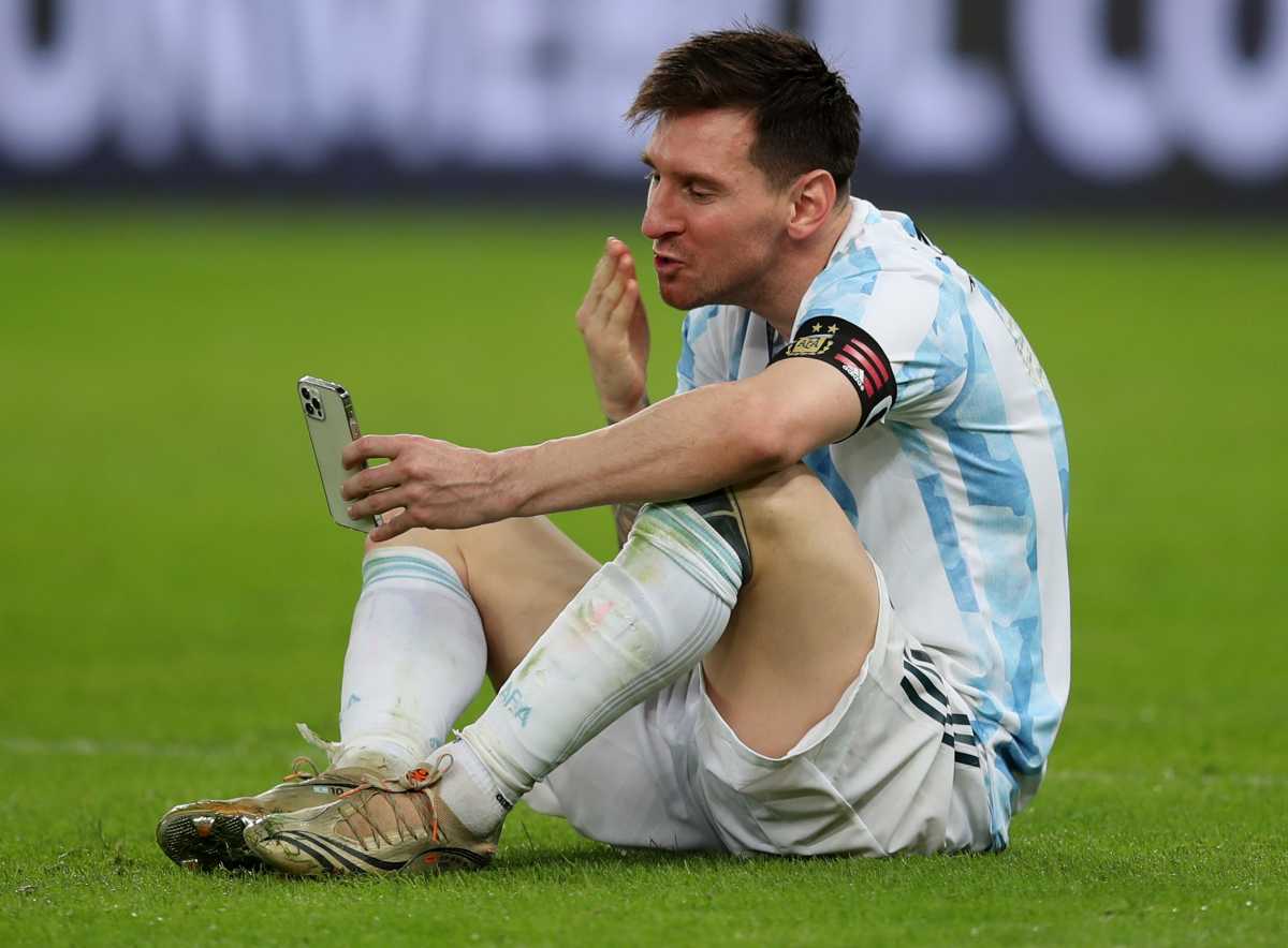 Soccer Football - Copa America  2021 - Final - Brazil v Argentina - Estadio Maracana, Rio de Janeiro, Brazil - July 10, 2021 Argentina's Lionel Messi in a video-call at the pitch after winning the Copa America REUTERS