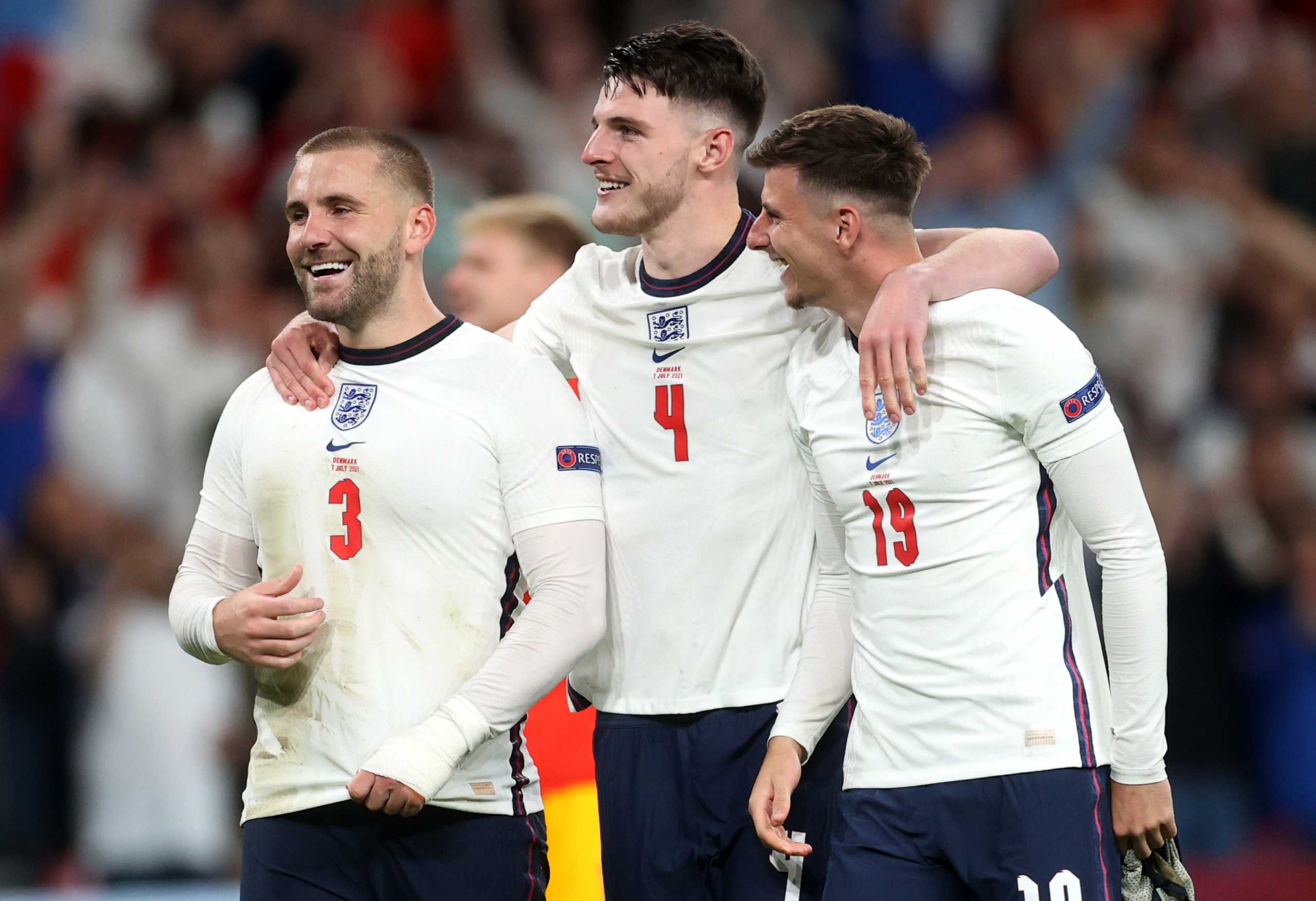 Soccer Football - Euro 2020 - Semi Final - England v Denmark - Wembley Stadium, London, Britain - July 7, 2021 England's Luke Shaw, Declan Rice and Mason Mount celebrate after the match Pool via REUTERS