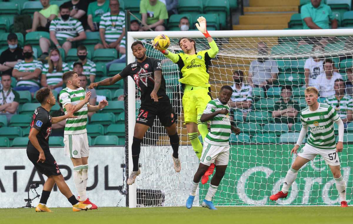 Soccer Football - Champions League - Second Qualifying Round - Celtic v FC Midtjylland - Celtic Park, Glasgow, Scotland, Britain - July 20, 2021  Celtic's Vasilis Barkas in action with FC Midtjylland's Junior Brumado REUTERS