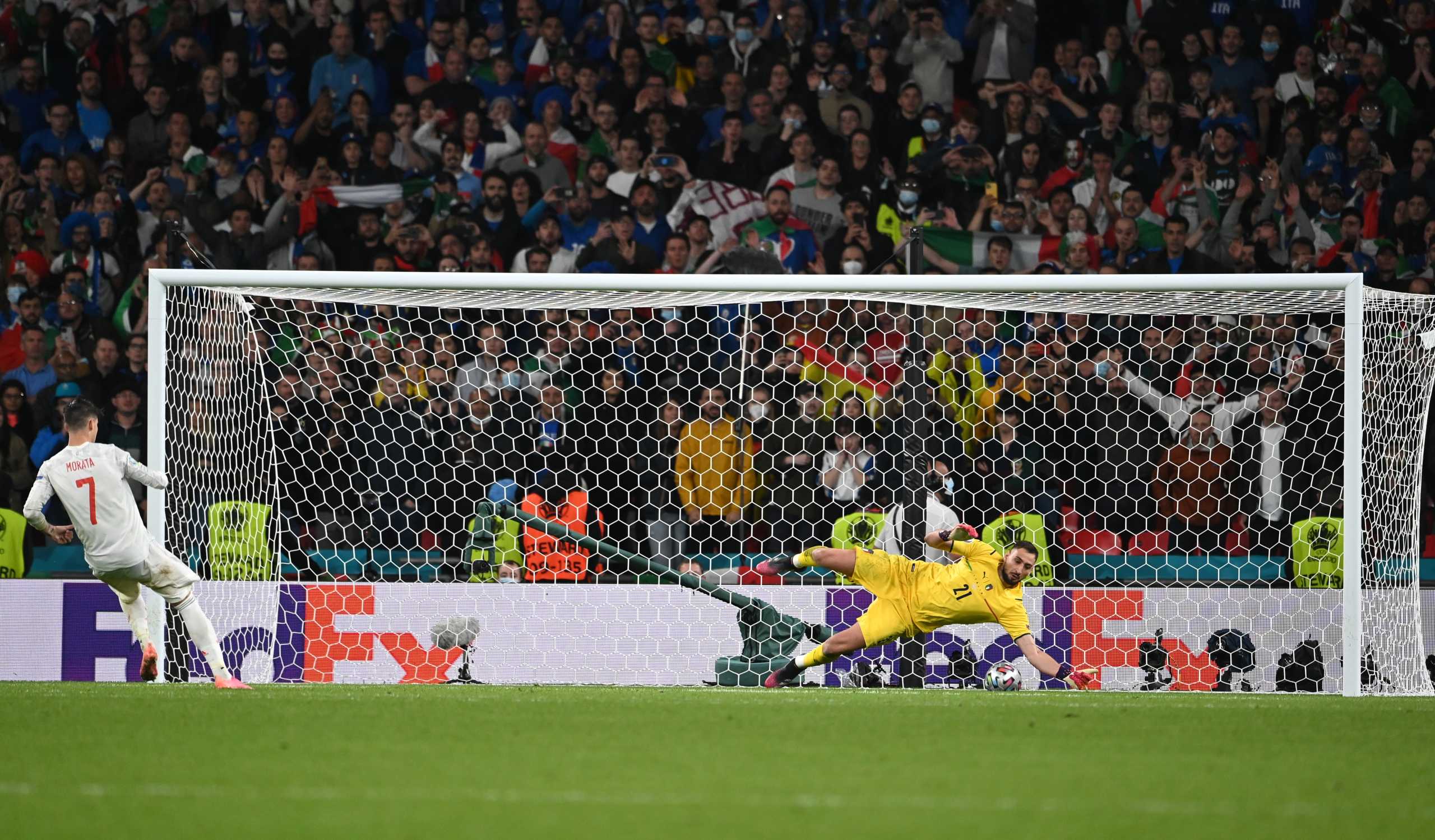 Soccer Football - Euro 2020 - Semi Final - Italy v Spain - Wembley Stadium, London, Britain - July 6, 2021 Spain's Alvaro Morata misses a penalty during the shootout Pool via REUTERS