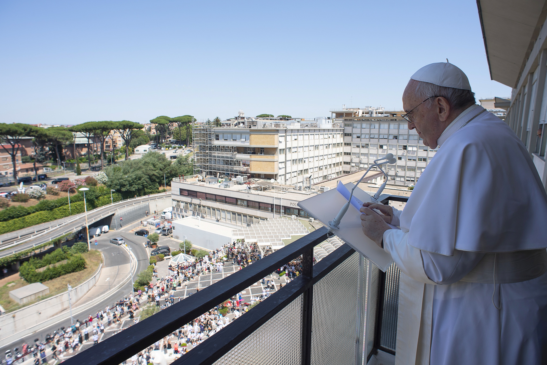 Pope Francis leads the Angelus prayer from a balcony of the Gemelli hospital, as he recovers following scheduled surgery on his colon, in Rome, Italy, July 11, 2021.  Vatican Media