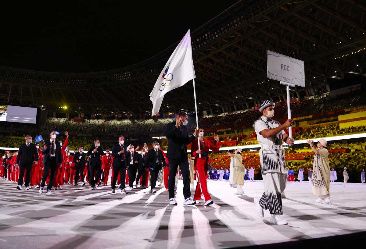 Tokyo 2020 Olympics - The Tokyo 2020 Olympics Opening Ceremony - Olympic Stadium, Tokyo, Japan - July 23, 2021. Flag bearer Sofya Velikaya of the Russian Olympic Committee leads her contingent during the athletes' parade at the opening ceremony REUTERS