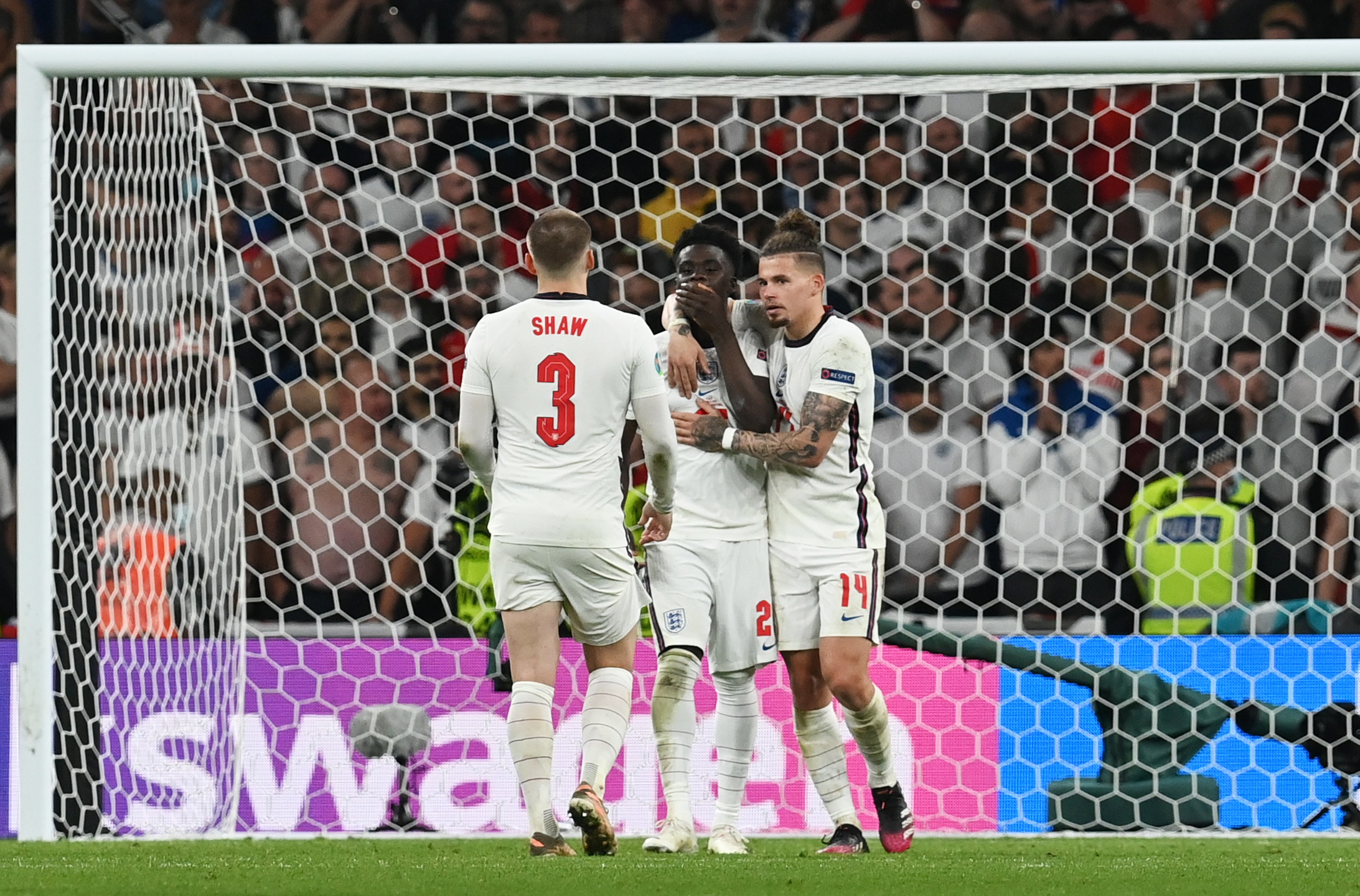 Soccer Football - Euro 2020 - Final - Italy v England - Wembley Stadium, London, Britain - July 11, 2021 England's Bukayo Saka, Luke Shaw and Kalvin Phillips look dejected after a penalty shootout Pool via REUTERS