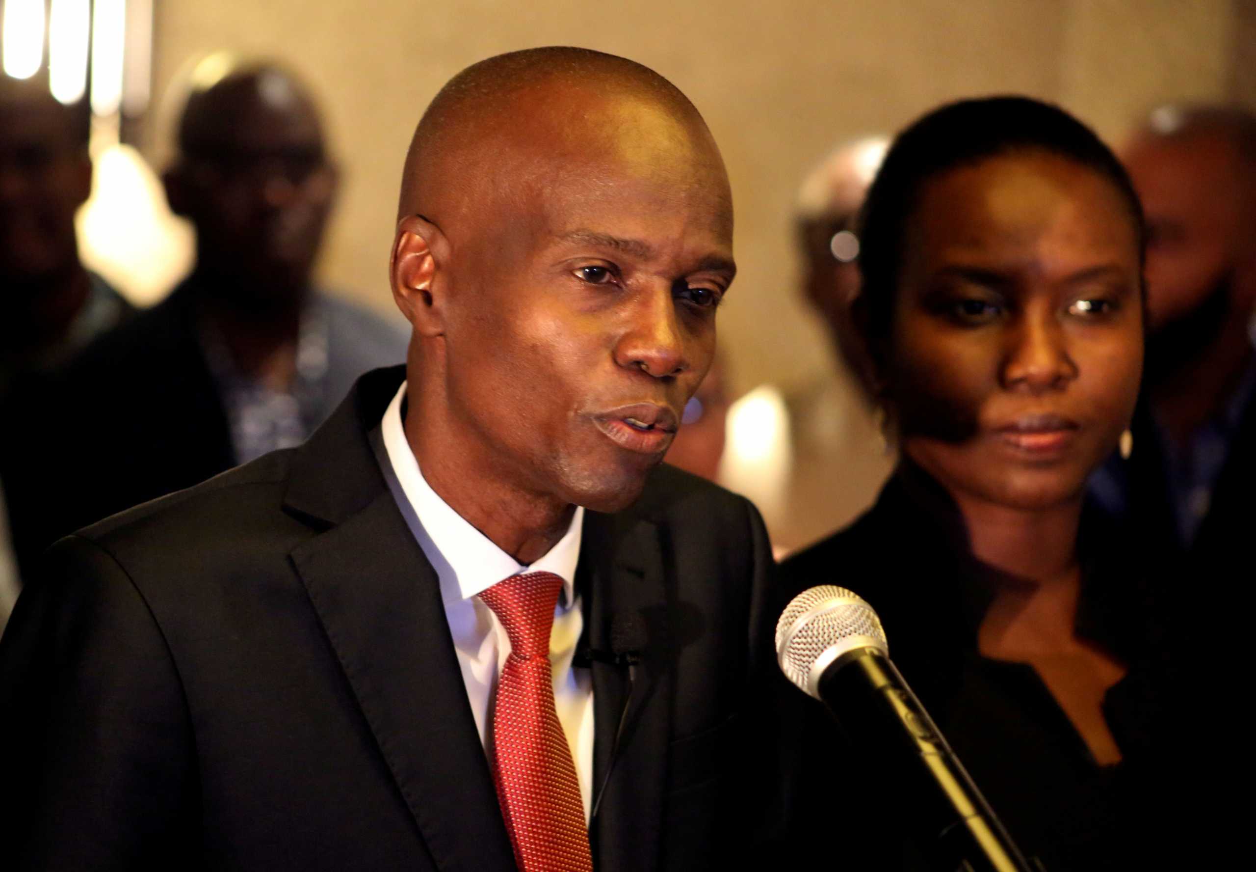 FILE PHOTO: Jovenel Moise addresses the media next to his wife Martine after winning the 2016 presidential election, in Port-au-Prince, Haiti. Picture taken November 28, 2016. REUTERS