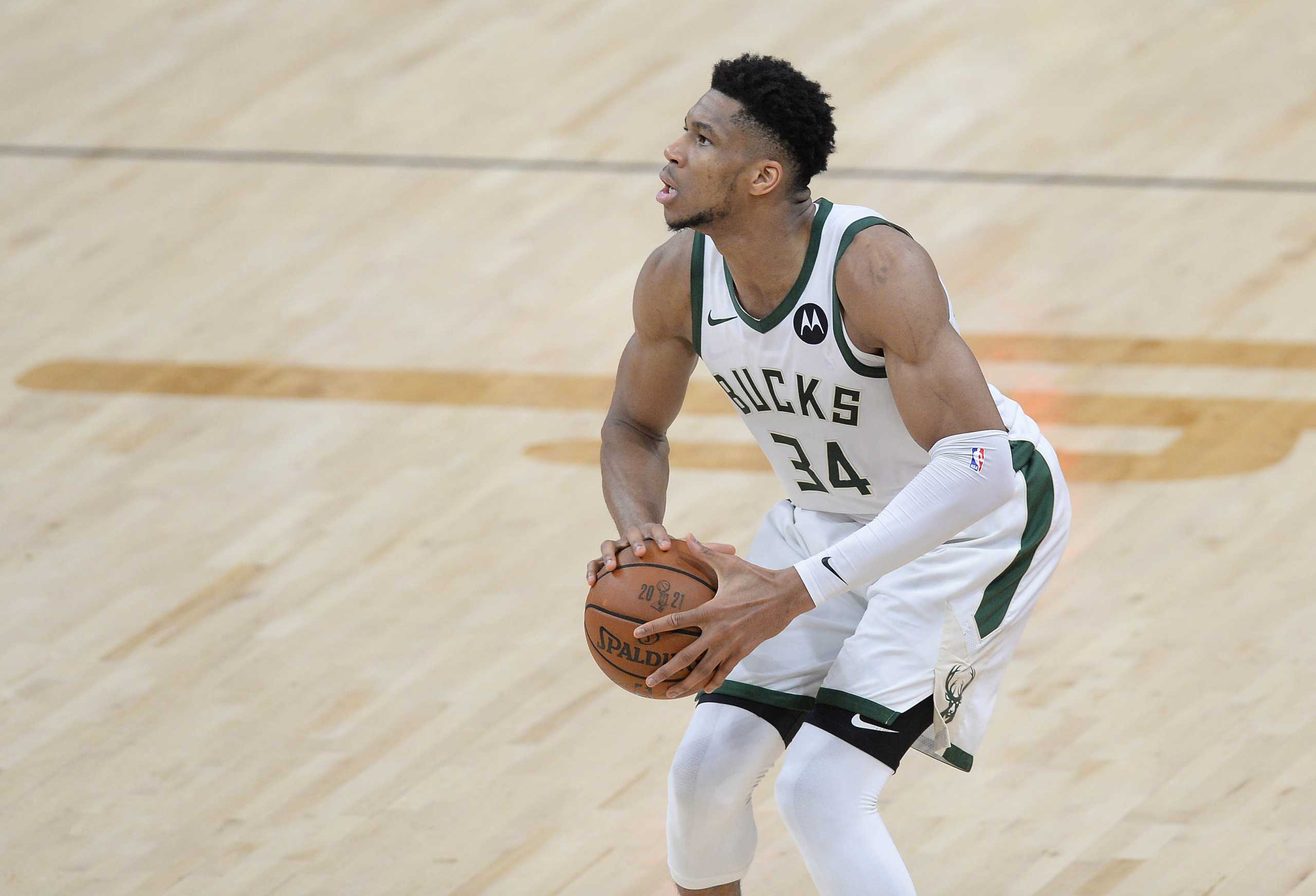 Jul 8, 2021; Phoenix, Arizona, USA; Milwaukee Bucks forward Giannis Antetokounmpo (34) shoots against the Phoenix Suns during the first half in game two of the 2021 NBA Finals at Phoenix Suns Arena. Mandatory Credit: Joe Camporeale-USA TODAY Sports