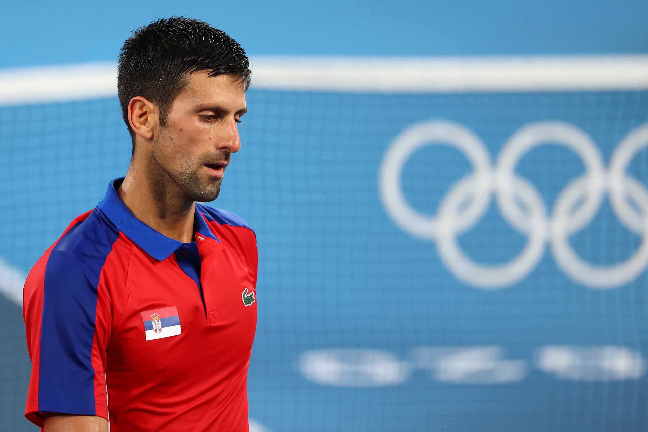 Tokyo 2020 Olympics - Tennis - Men's Singles - Semifinal - Ariake Tennis Park - Tokyo, Japan - July 30, 2021. Novak Djokovic of Serbia reacts during his semifinal match against Alexander Zverev of Germany REUTERS
