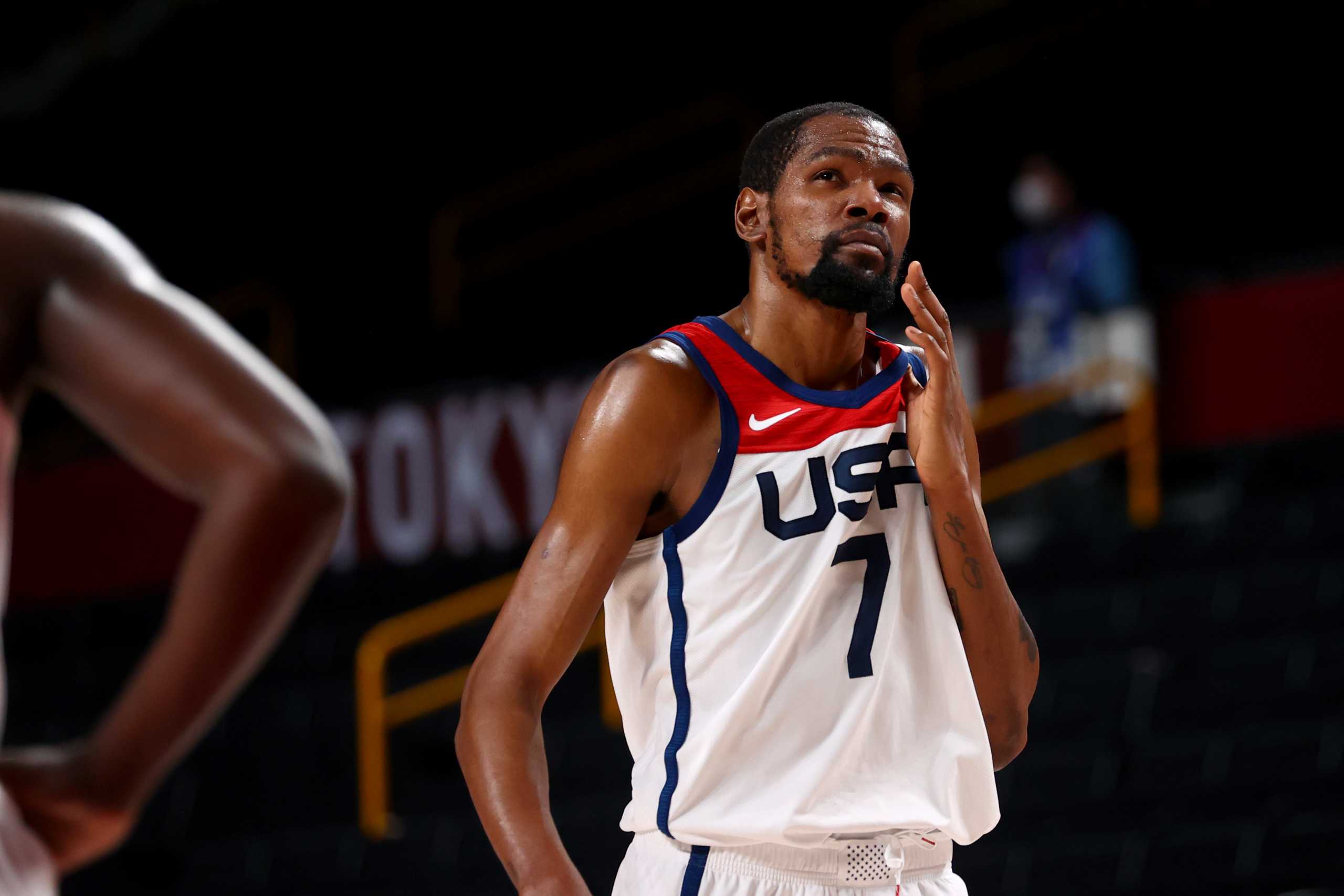 Tokyo 2020 Olympics - Basketball - Men - Group A - United States v Czech Republic - Saitama Super Arena, Saitama, Japan - July 31, 2021. Kevin Durant of the United States reacts after a clash REUTERS