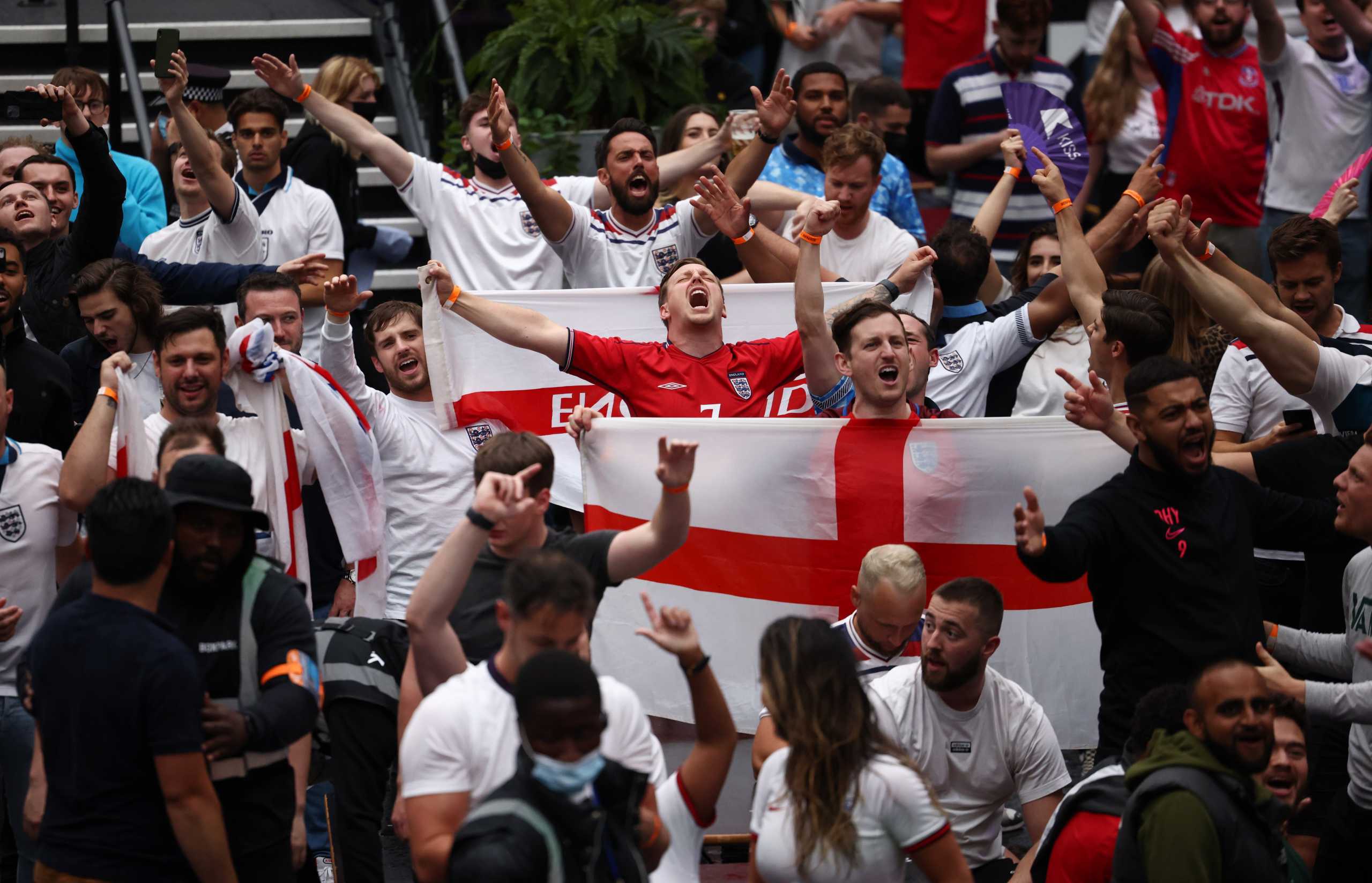 Soccer Football - Euro 2020 - Fans gather for England v Germany - London, Britain - June 29, 2021 England fan celebrate in Boxpark, Croydon after the match REUTERS
