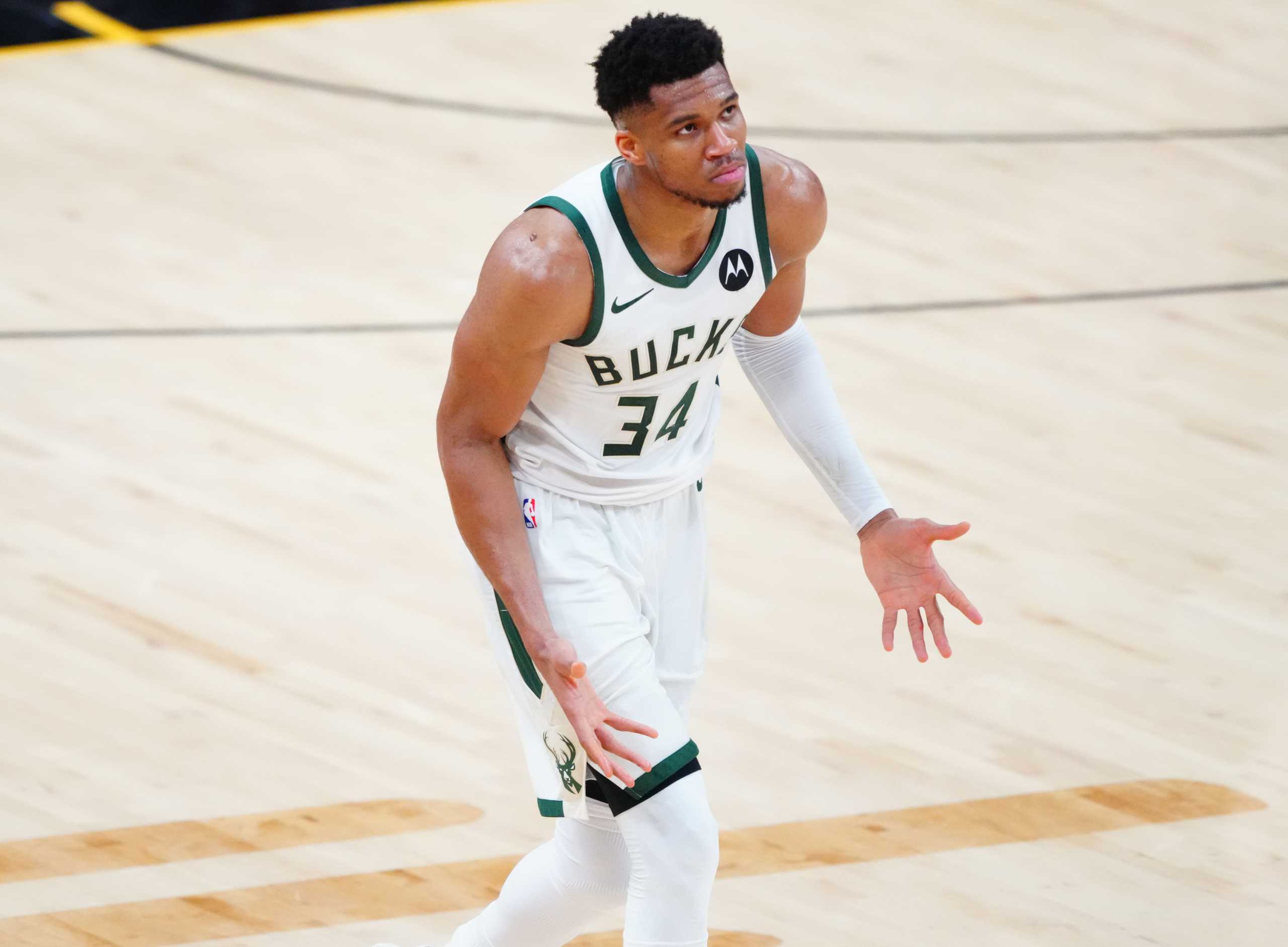 Jul 6, 2021; Phoenix, Arizona, USA; Milwaukee Bucks forward Giannis Antetokounmpo (34) reacts against the Phoenix Suns during the second half in game one of the 2021NBA Finals at Phoenix Suns Arena. Mandatory Credit: Mark J. Rebilas-USA TODAY Sports