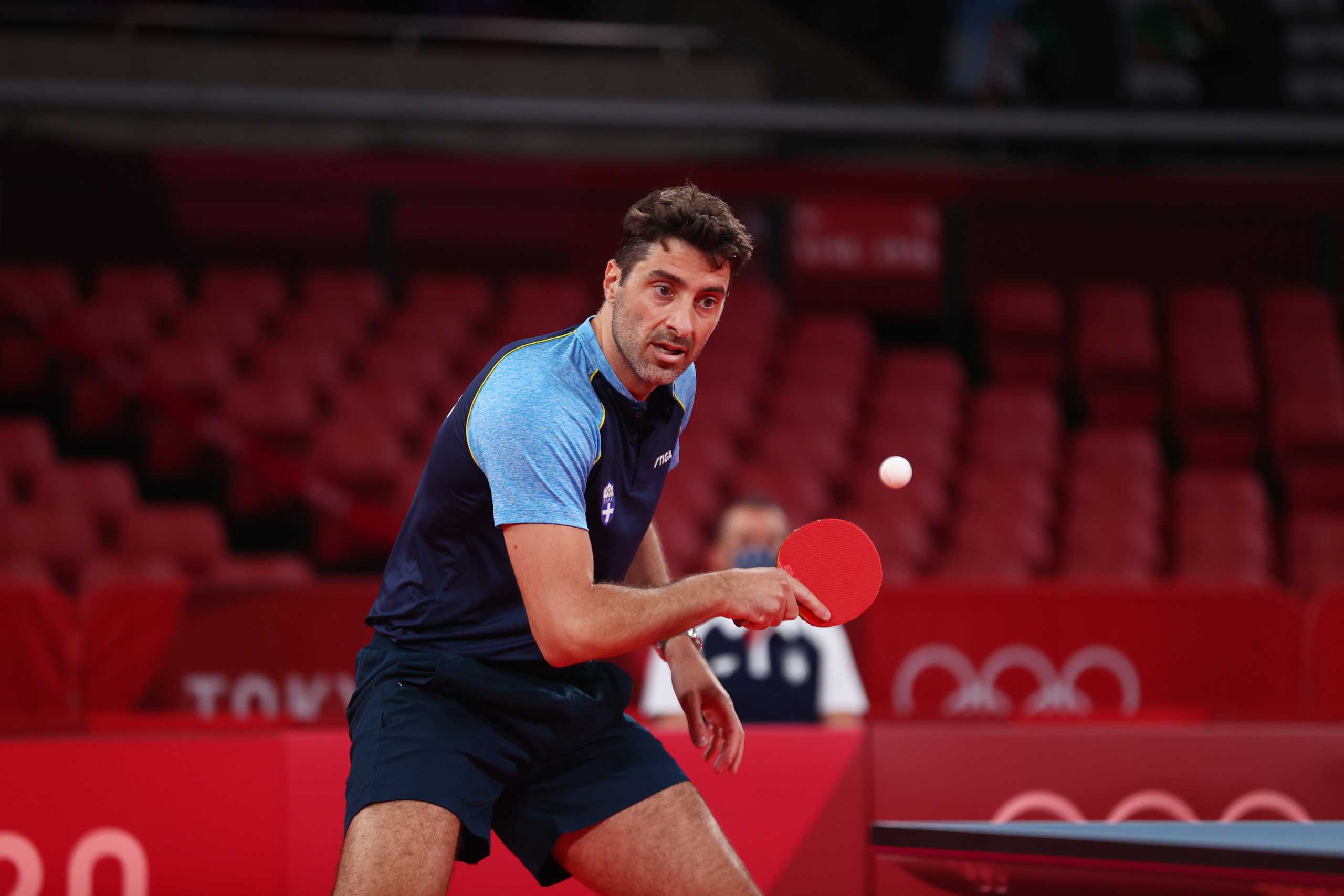 Tokyo 2020 Olympics - Table Tennis - Men's Singles - Round 1 - Tokyo Metropolitan Gymnasium - Tokyo, Japan - July 24, 2021.  Panagiotis Gionis of Greece in action against  Zolt Pete of Serbia REUTERS