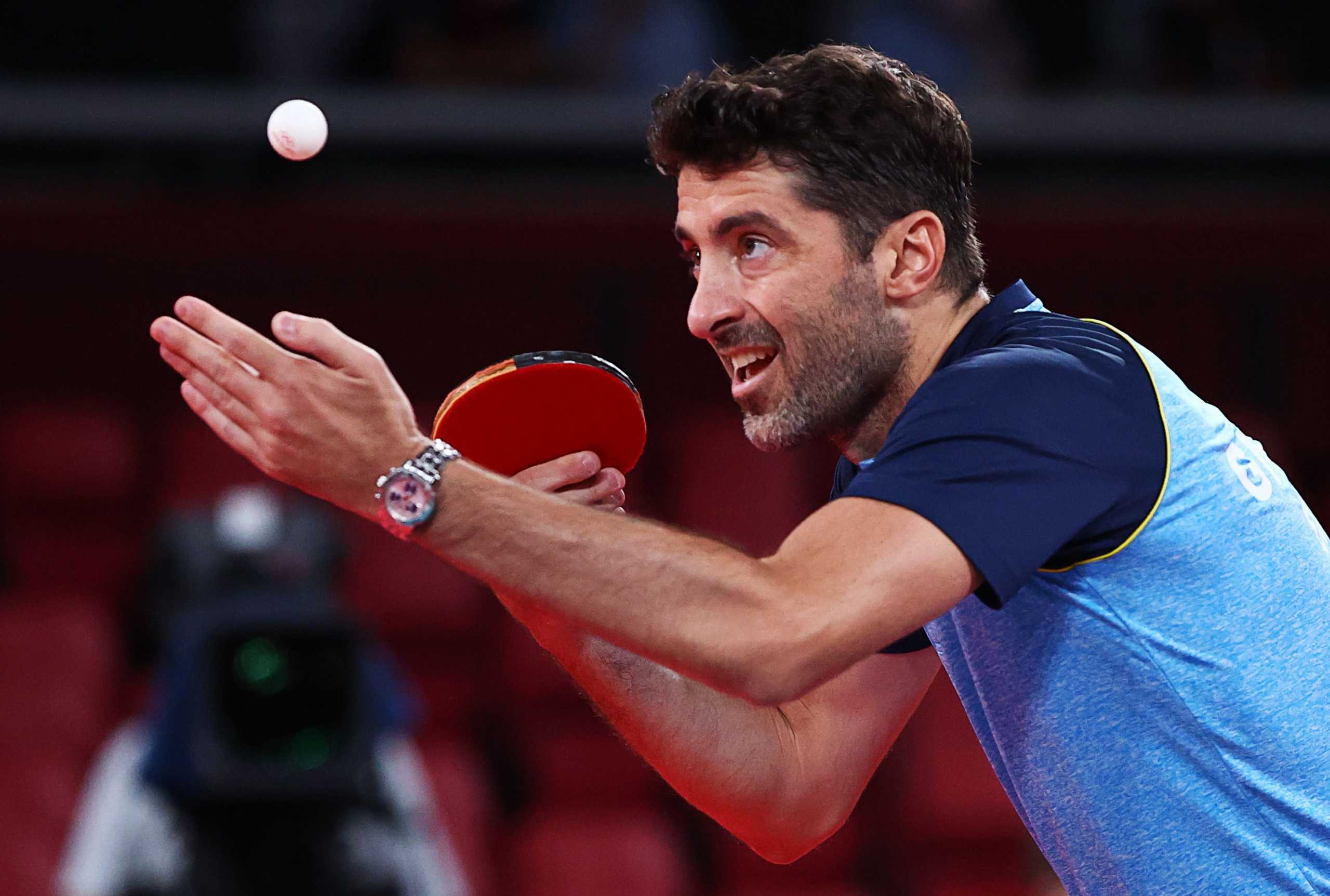 Tokyo 2020 Olympics - Table Tennis - Men's Singles - Round 3 - Tokyo Metropolitan Gymnasium - Tokyo, Japan - July 27, 2021.  Panagiotis Gionis of Greece in action against Jeoung Young-Sik of South Korea REUTERS