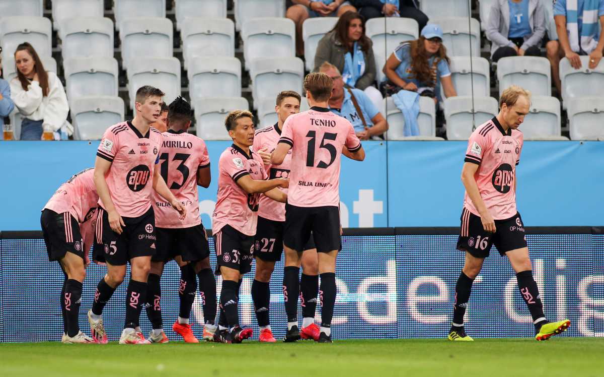 Soccer Football - Champions League - Second Qualifying Round - First Leg - Malmo FF v HJK Helsinki - Malmo New Stadium, Malmo, Sweden - July 21, 2021 HJK Helsinki's Roope Riski celebrates scoring their first goal with teammates Anders Bjuro