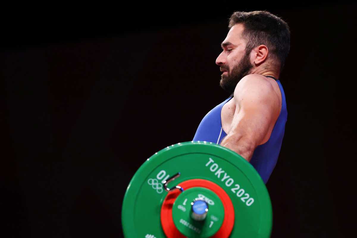 Tokyo 2020 Olympics - Weightlifting - Men's 96kg - Group B - Tokyo International Forum, Tokyo, Japan - July 31, 2021. Theodoros Iakovidis of Greece in action. REUTERS